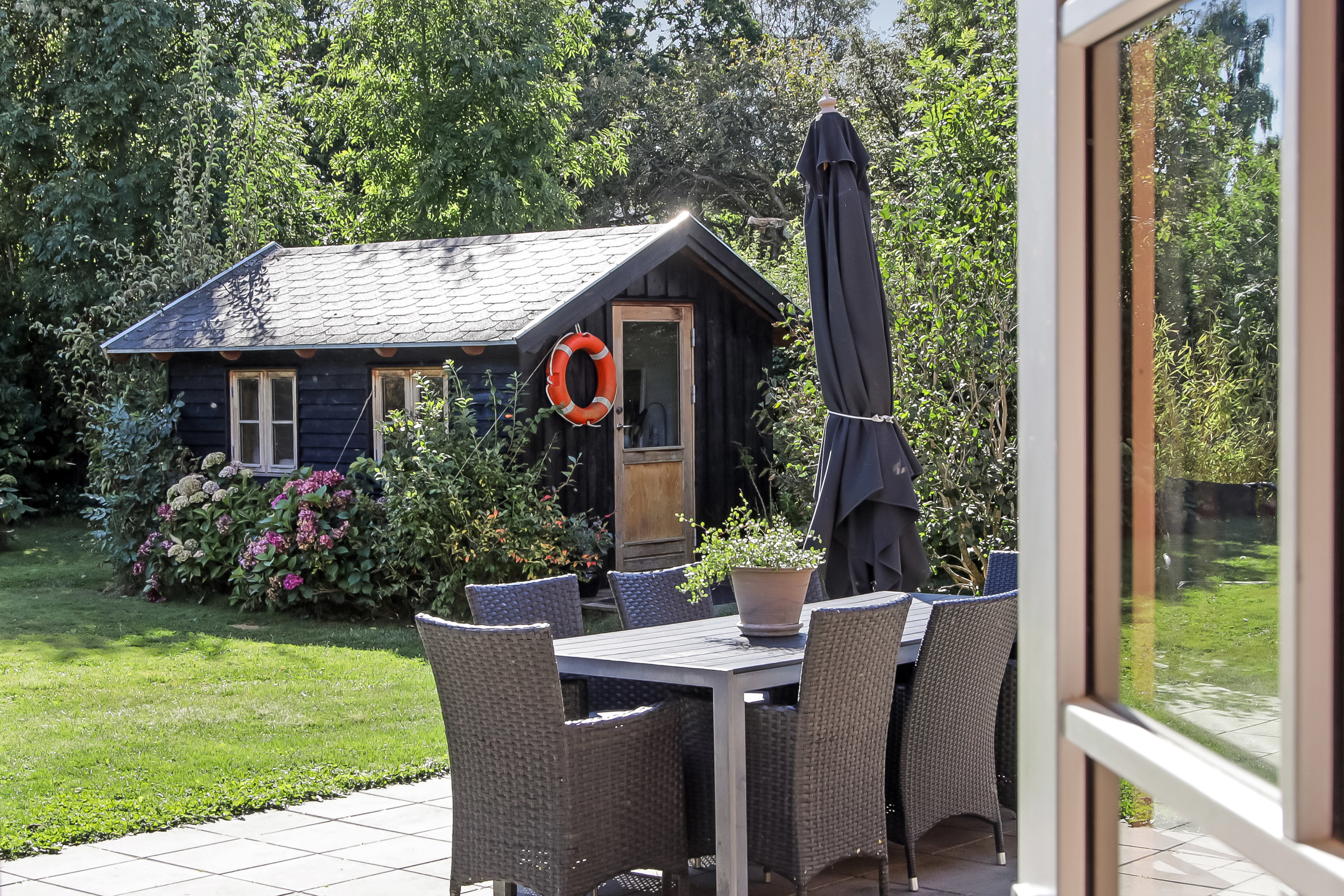 Fremhævet terrasse billede i fuldskærmstilstand. Billede af Åbyvejen 4, 5881 Skårup Fyn