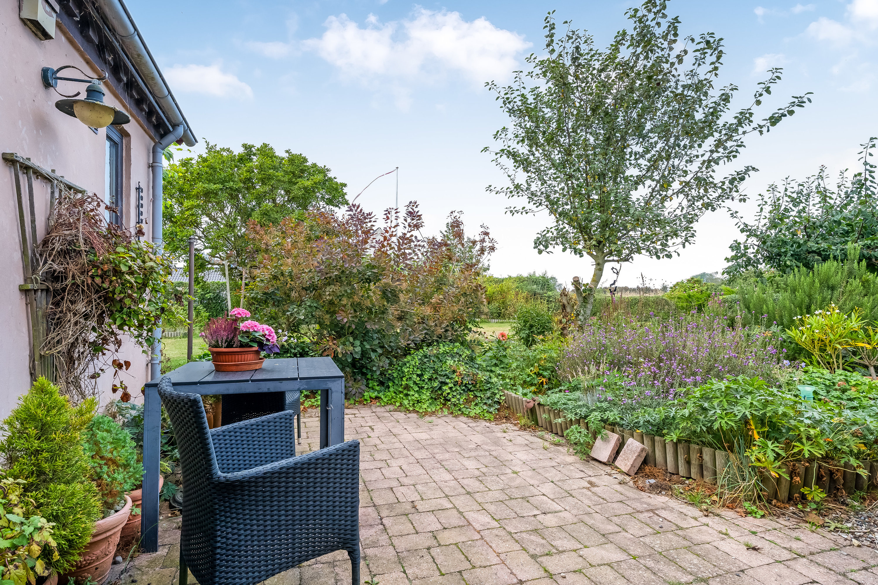 Fremhævet terrasse billede i fuldskærmstilstand. Billede af Vensholmvej 20, Købelev, 4900 Nakskov