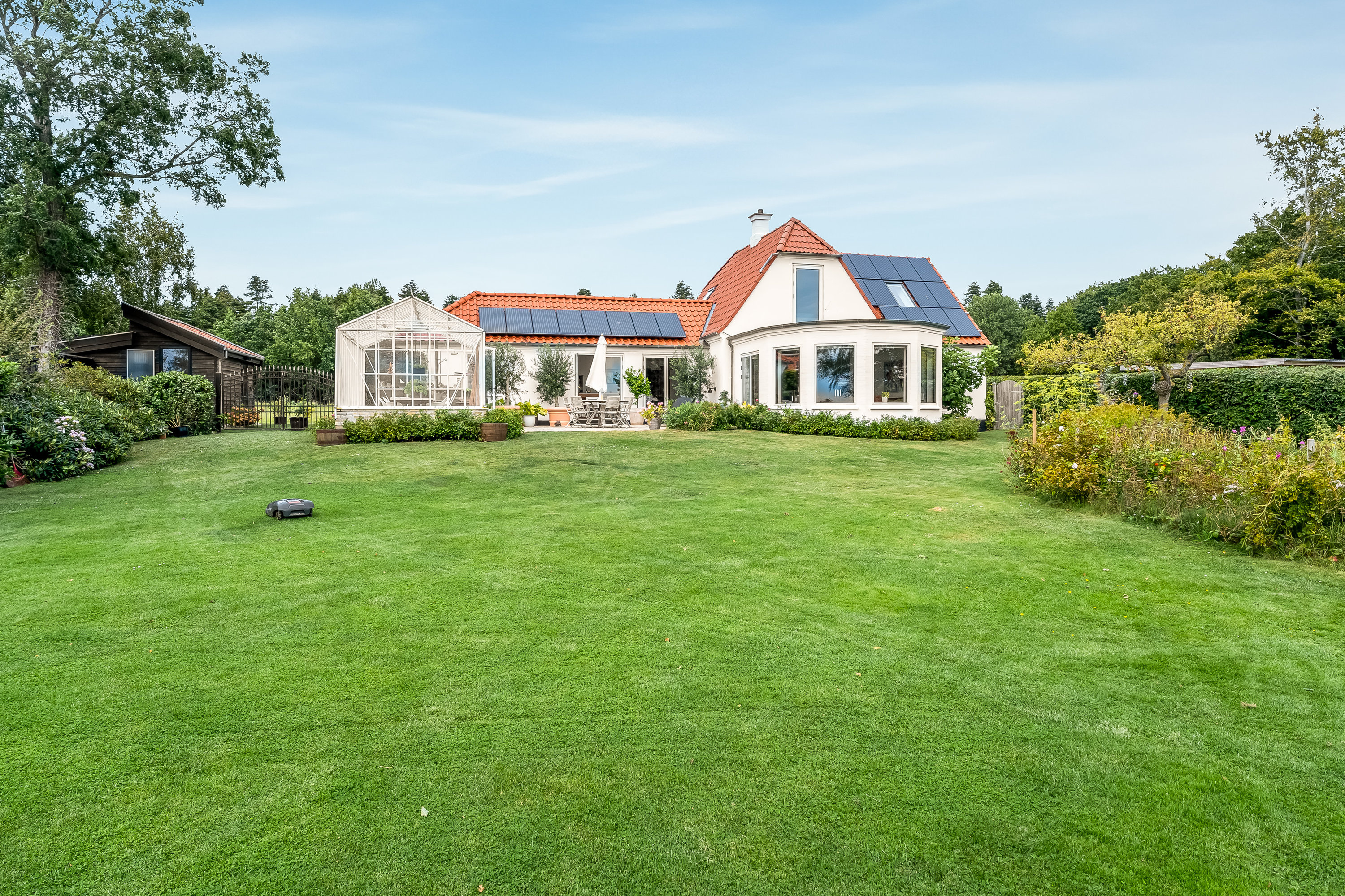 Fremhævet facade billede i fuldskærmstilstand. Billede af Hellenæs-Stien 17, 4912 Harpelunde