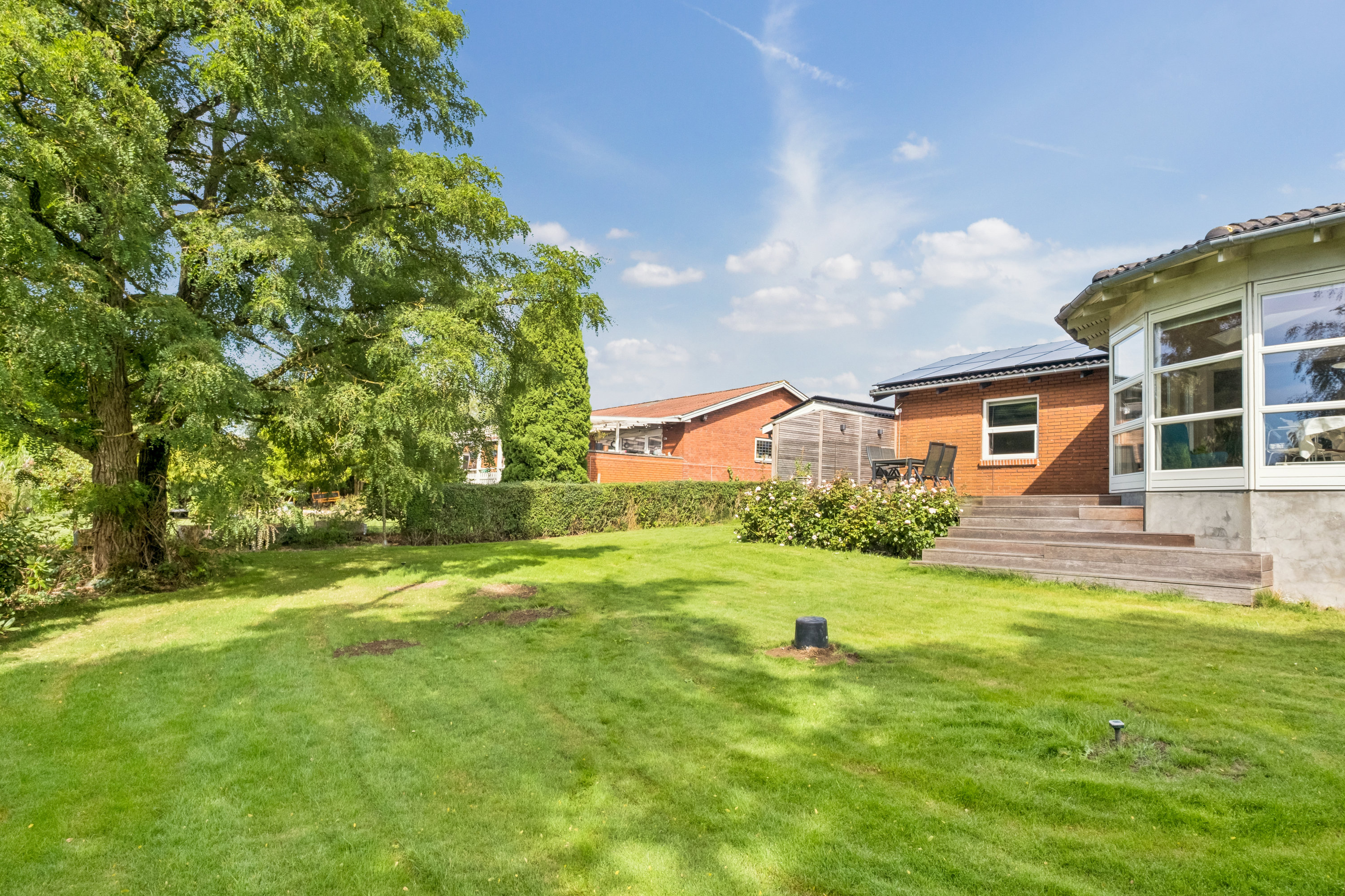 Fremhævet set fra haven billede i fuldskærmstilstand. Billede af Vestervænget 3, Tvingstrup, 8700 Horsens