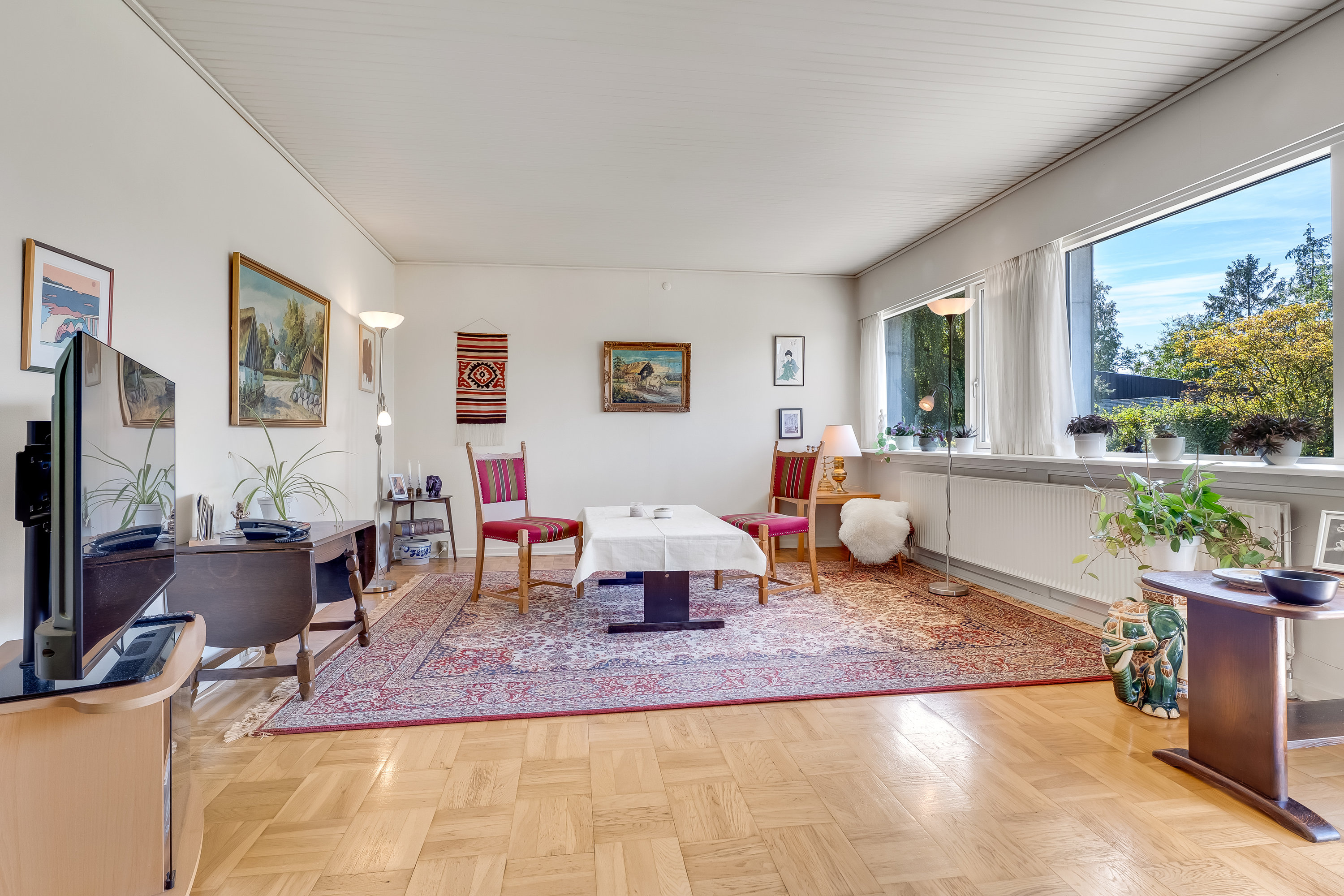 Fremhævet stue billede i fuldskærmstilstand. Billede af Peter Freuchensvej 24, 4800 Nykøbing F