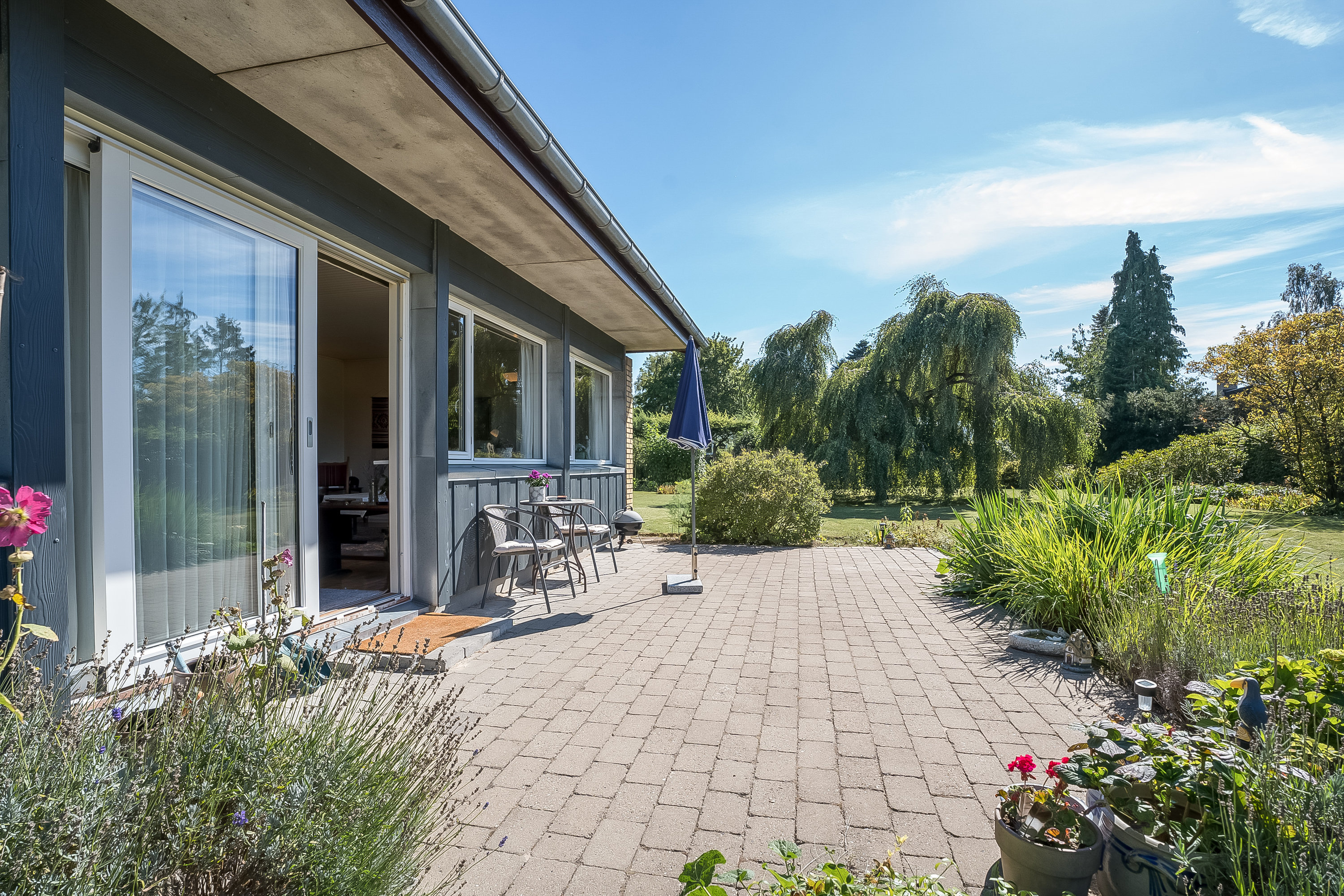 Fremhævet terrasse billede i fuldskærmstilstand. Billede af Peter Freuchensvej 24, 4800 Nykøbing F