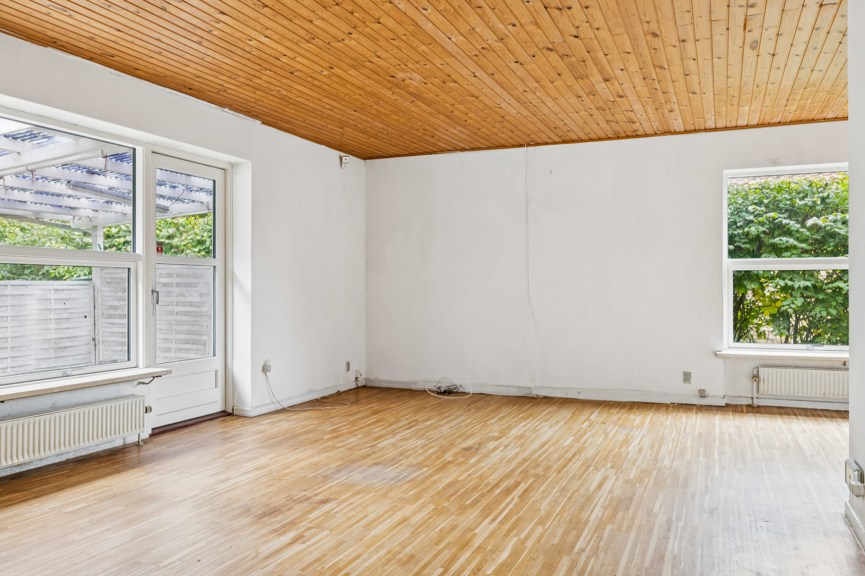 Fremhævet stue billede i fuldskærmstilstand. Billede af Tyrsbjergvej 110, Korup, 5210 Odense NV