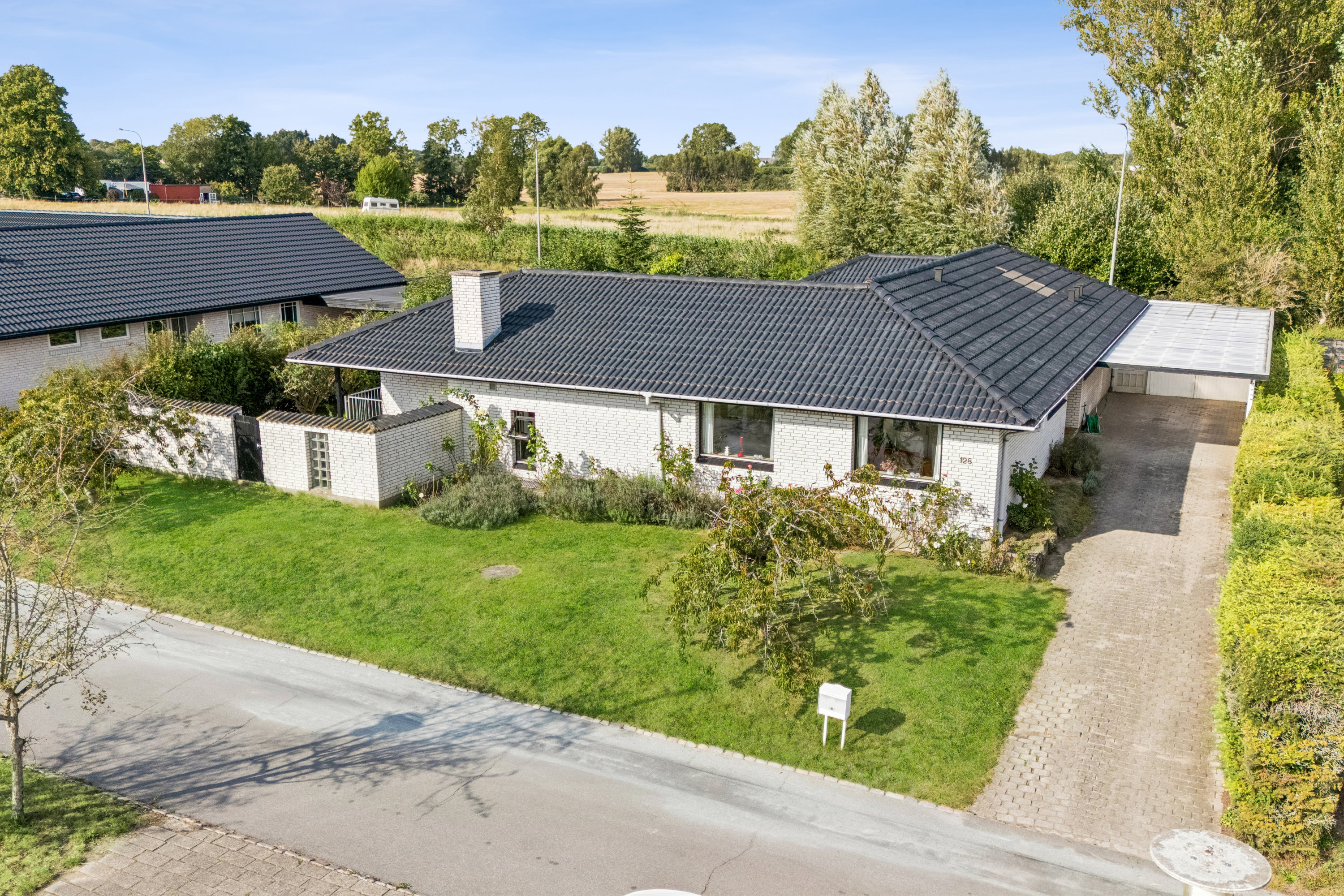 Villa: Ejendommen på Kronhjortløkken 128, Korup, 5210 Odense NV