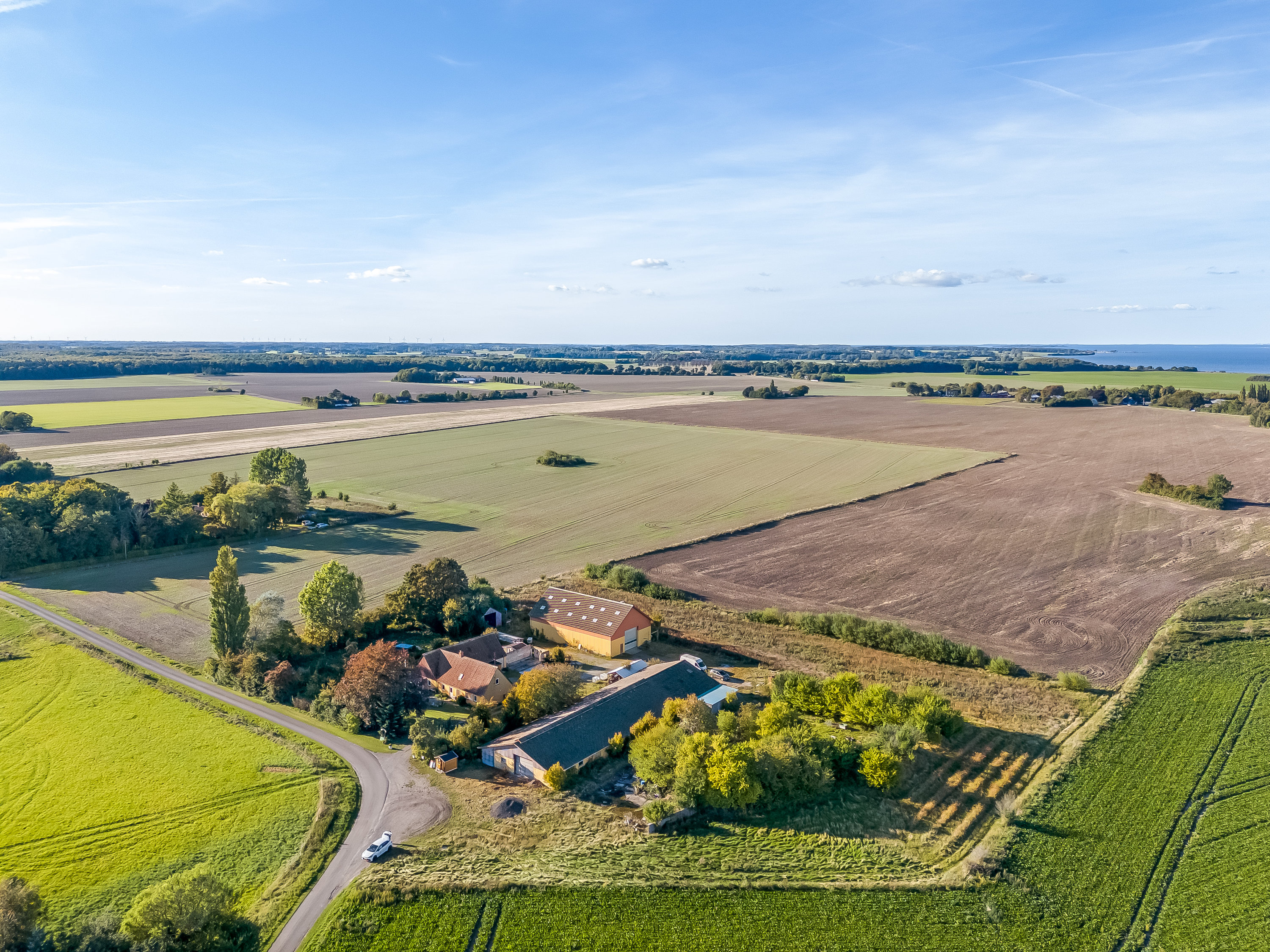 Fremhævet luftfoto billede i fuldskærmstilstand. Billede af Keldernæs Hovvej 4, 4952 Stokkemarke