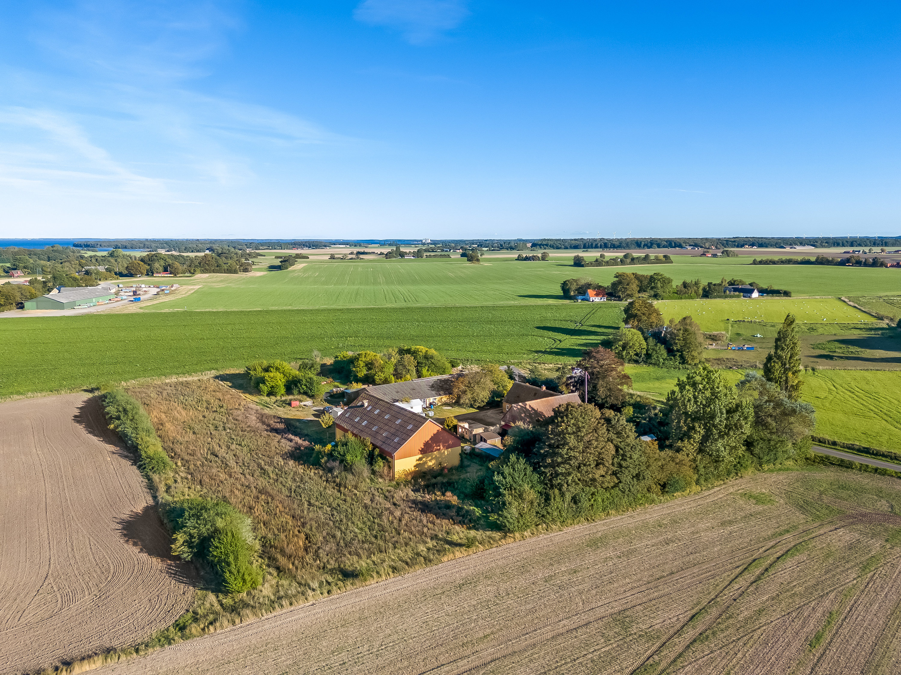 Fremhævet luftfoto billede i fuldskærmstilstand. Billede af Keldernæs Hovvej 4, 4952 Stokkemarke