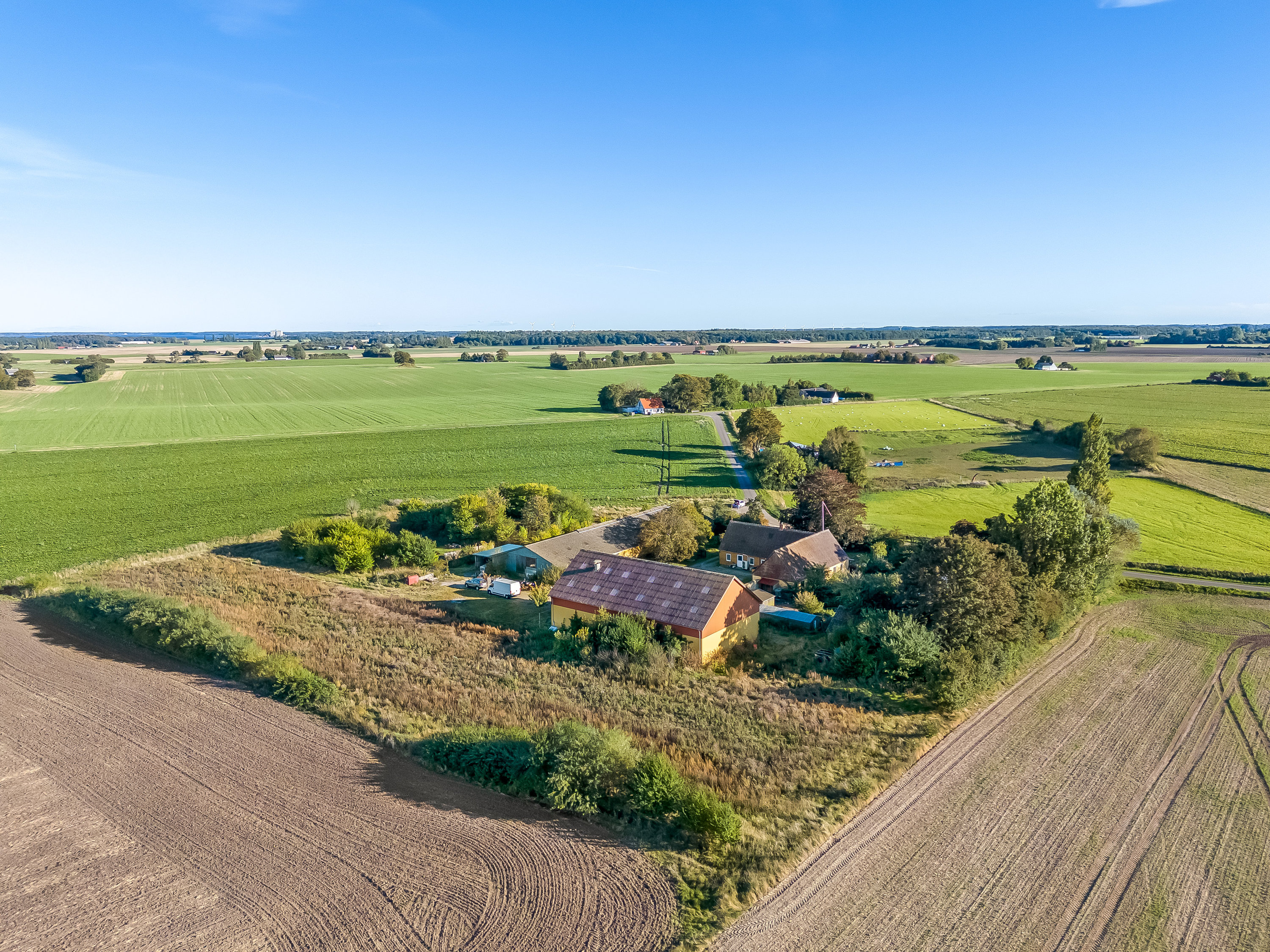 Fremhævet luftfoto billede i fuldskærmstilstand. Billede af Keldernæs Hovvej 4, 4952 Stokkemarke