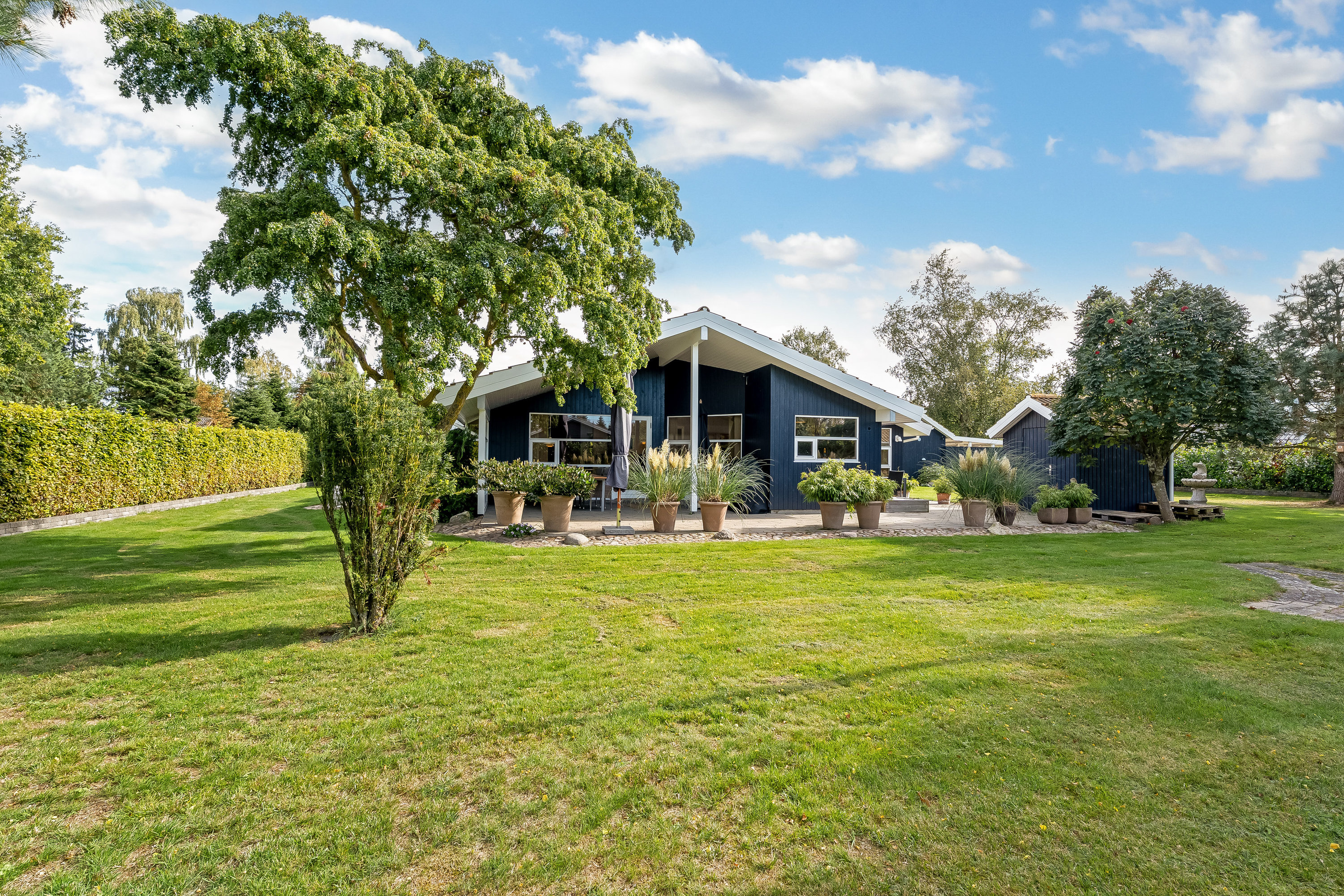 Fremhævet facade billede i fuldskærmstilstand. Billede af Mælkebøttevej 27, 4873 Væggerløse