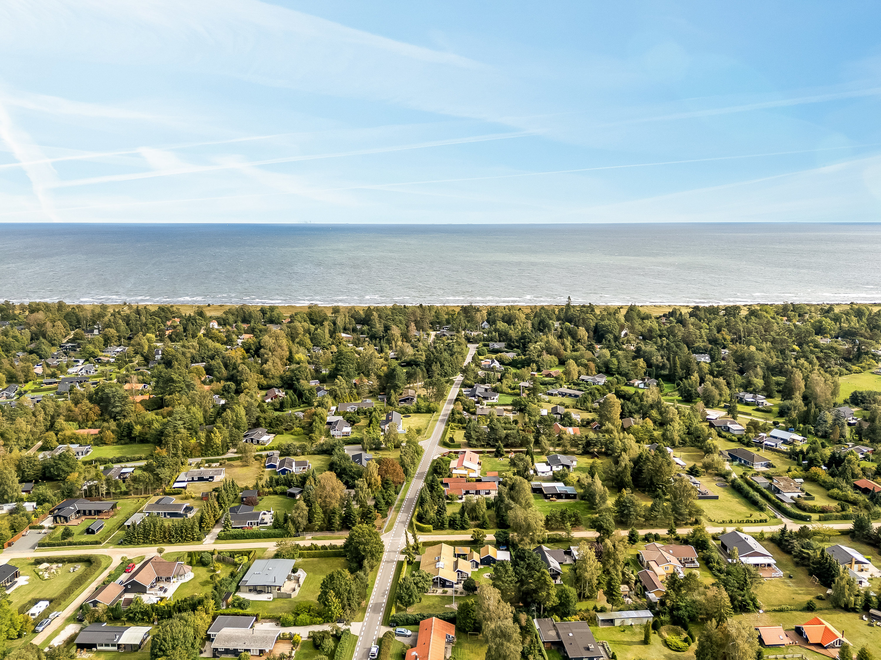 Fremhævet luftfoto billede i fuldskærmstilstand. Billede af Mælkebøttevej 27, 4873 Væggerløse