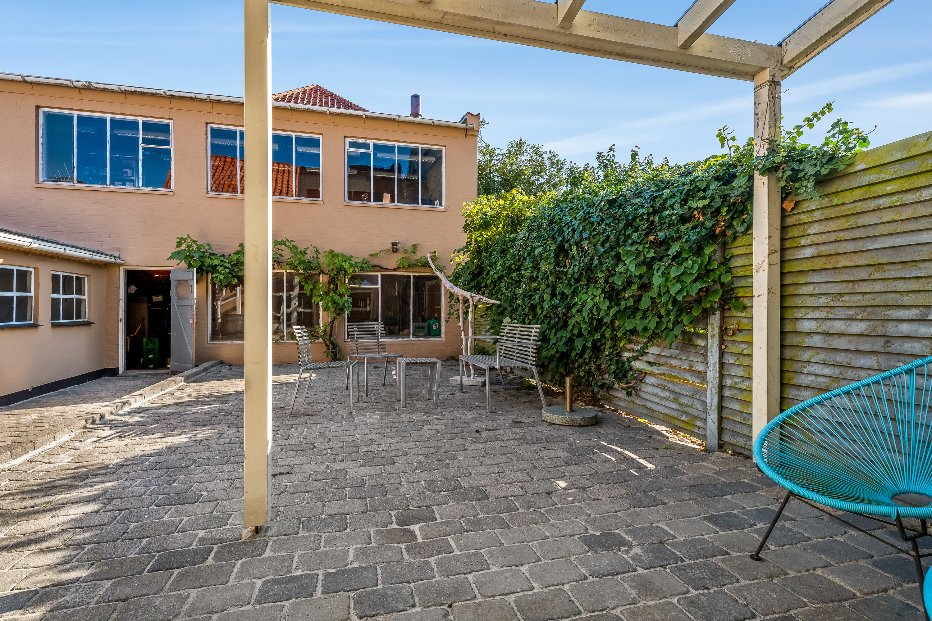 Fremhævet overdækket terrasse billede i fuldskærmstilstand. Billede af Holchsgade 2, 4800 Nykøbing F