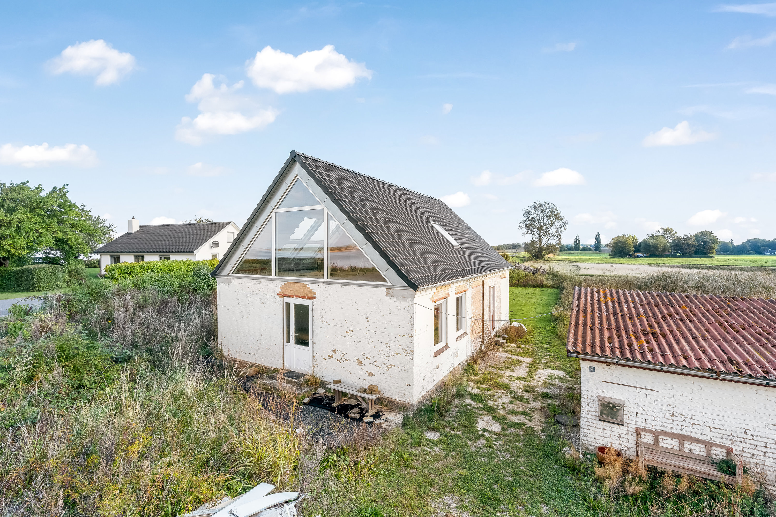 Fremhævet facade billede i fuldskærmstilstand. Billede af Dæmningsvej 9, Nørre Vedby, 4840 Nørre Alslev