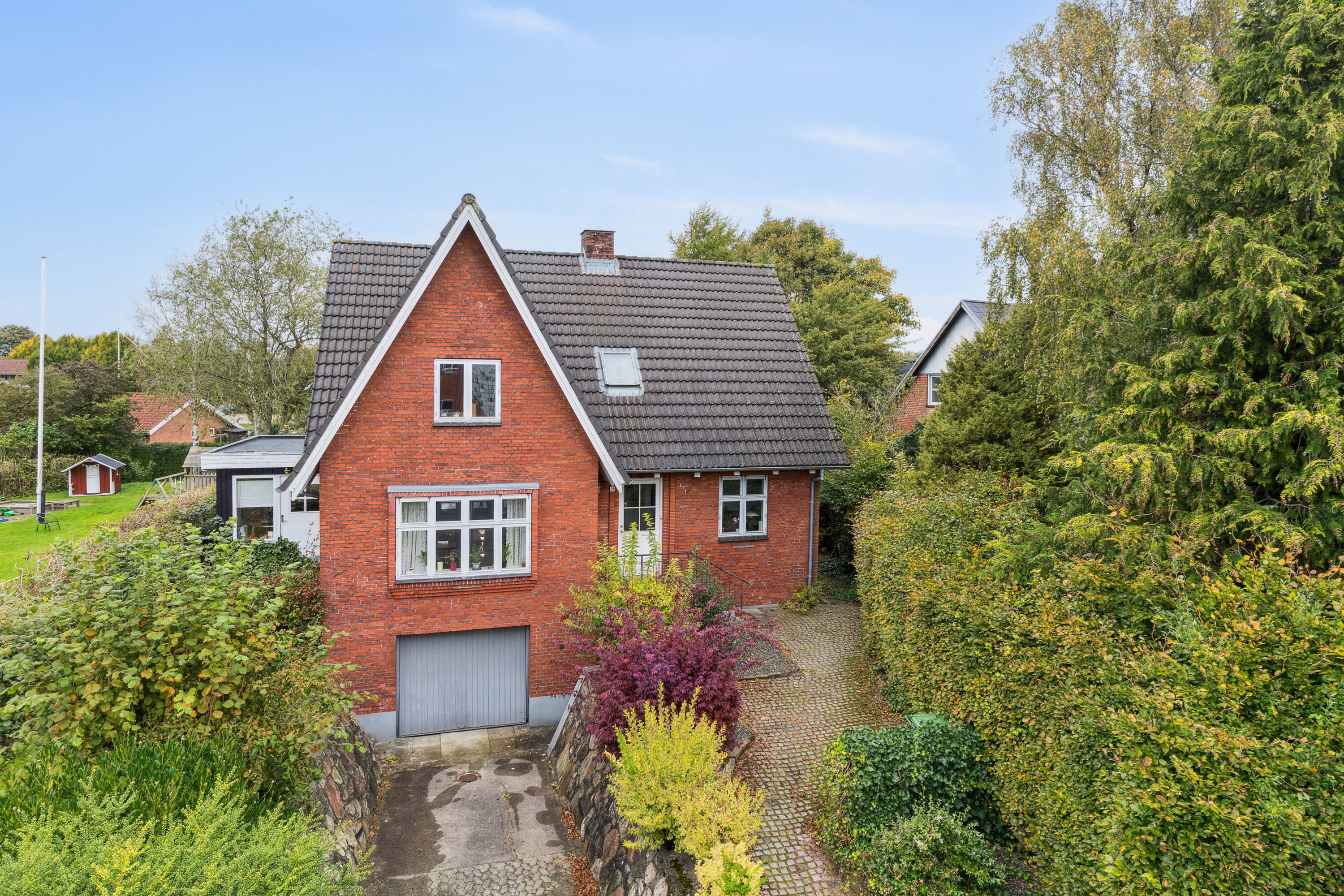 Fremhævet set fra haven billede i fuldskærmstilstand. Billede af Østergade 31, 6040 Egtved