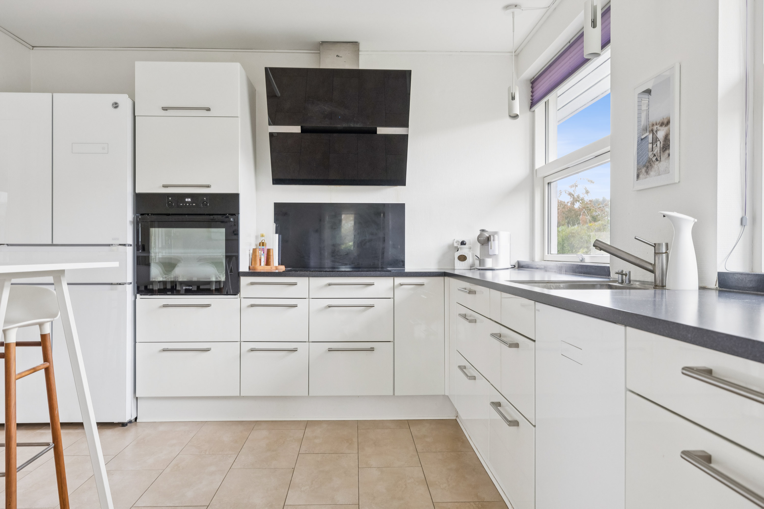 Fremhævet køkken billede i fuldskærmstilstand. Billede af Løvsangervænget 9, Snestrup, 5210 Odense NV