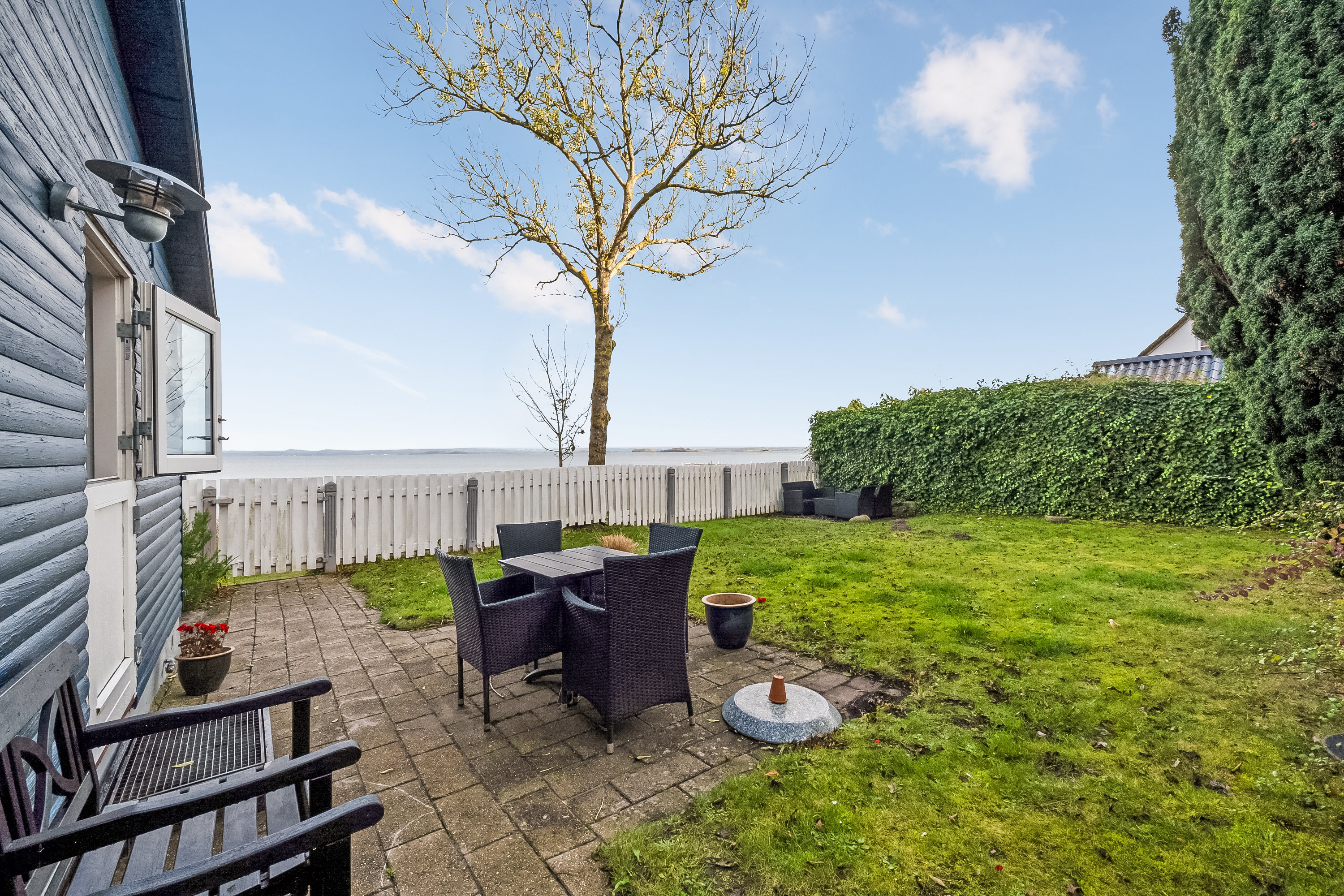 Fremhævet terrasse billede i fuldskærmstilstand. Billede af Strandbakken 59, Helnæs, 5631 Ebberup