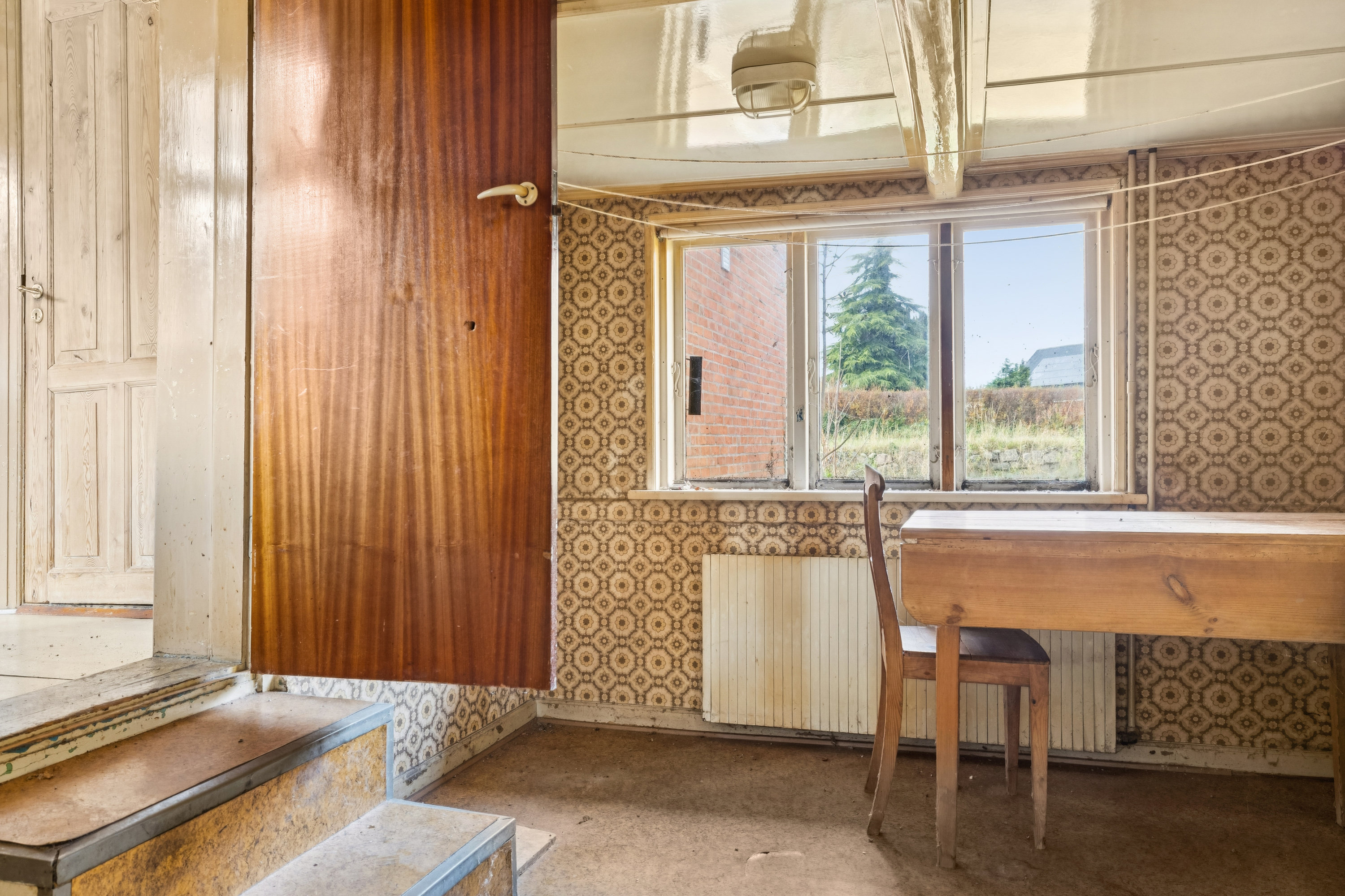 Fremhævet stue billede i fuldskærmstilstand. Billede af Nørrebro 21, 5985 Søby Ærø