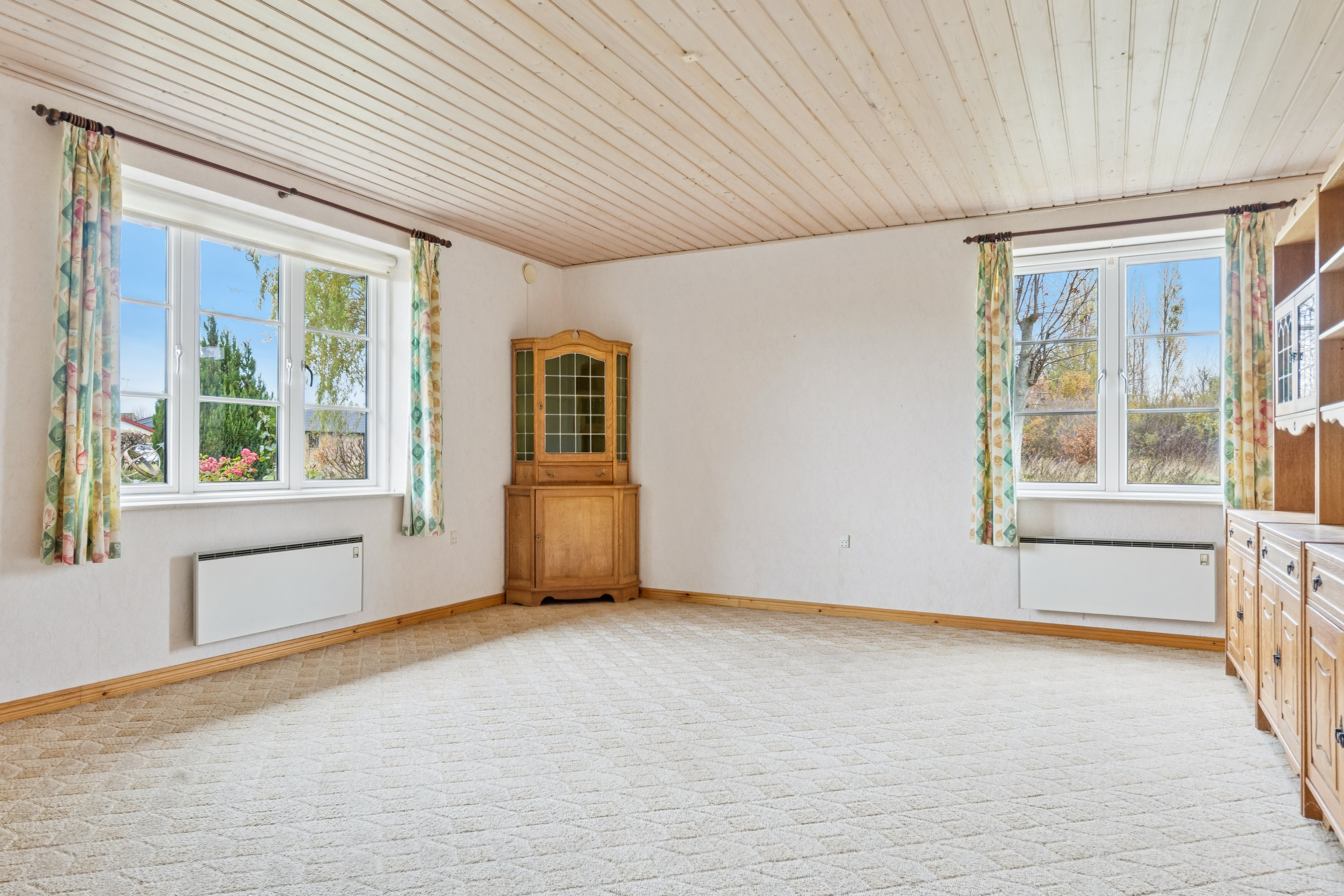 Fremhævet stue billede i fuldskærmstilstand. Billede af Østervænget 30, Ommel, 5960 Marstal