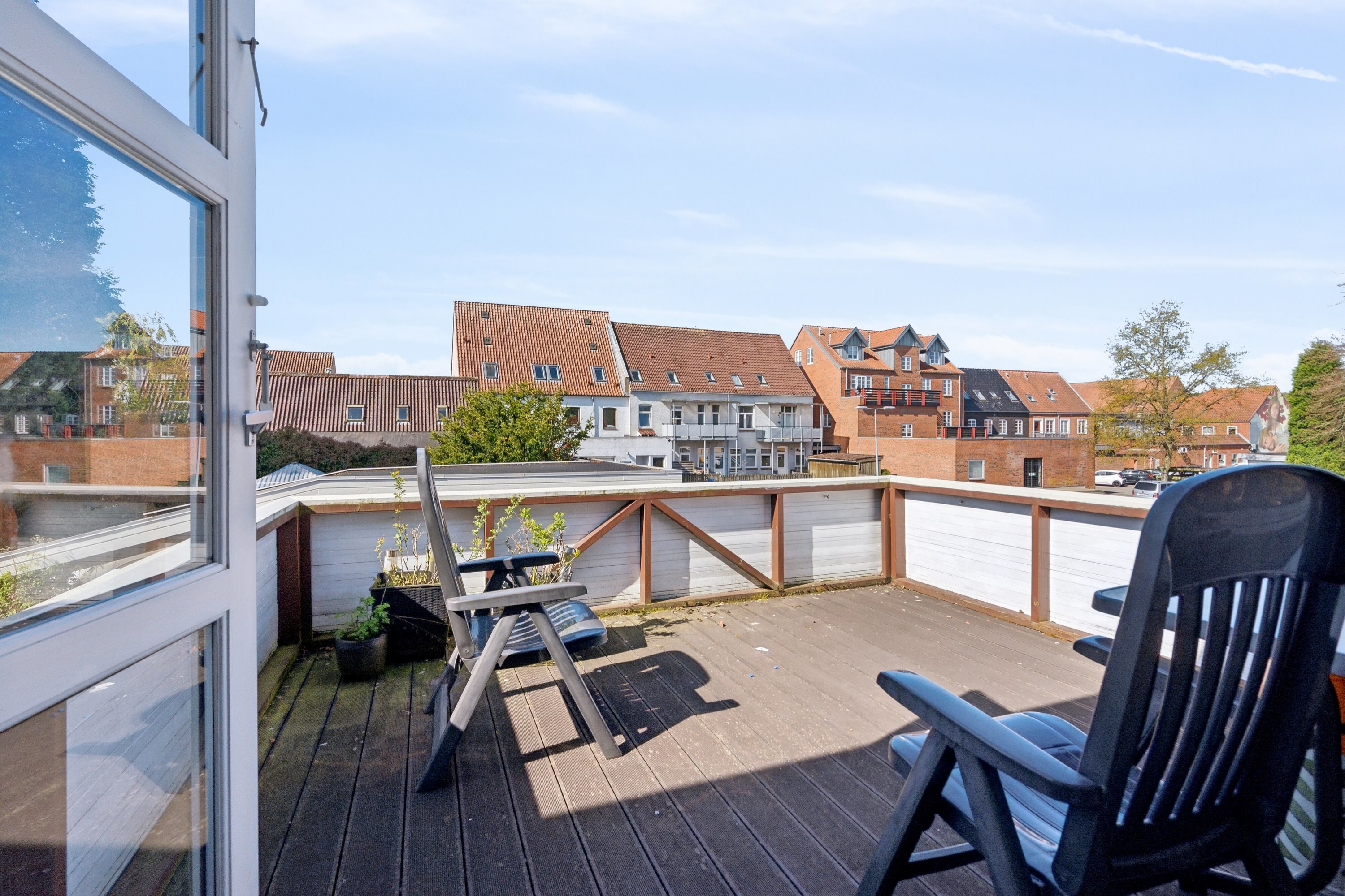 Fremhævet terrasse - 1. sal billede i fuldskærmstilstand. Billede af Fredensgade 16, 6300 Gråsten