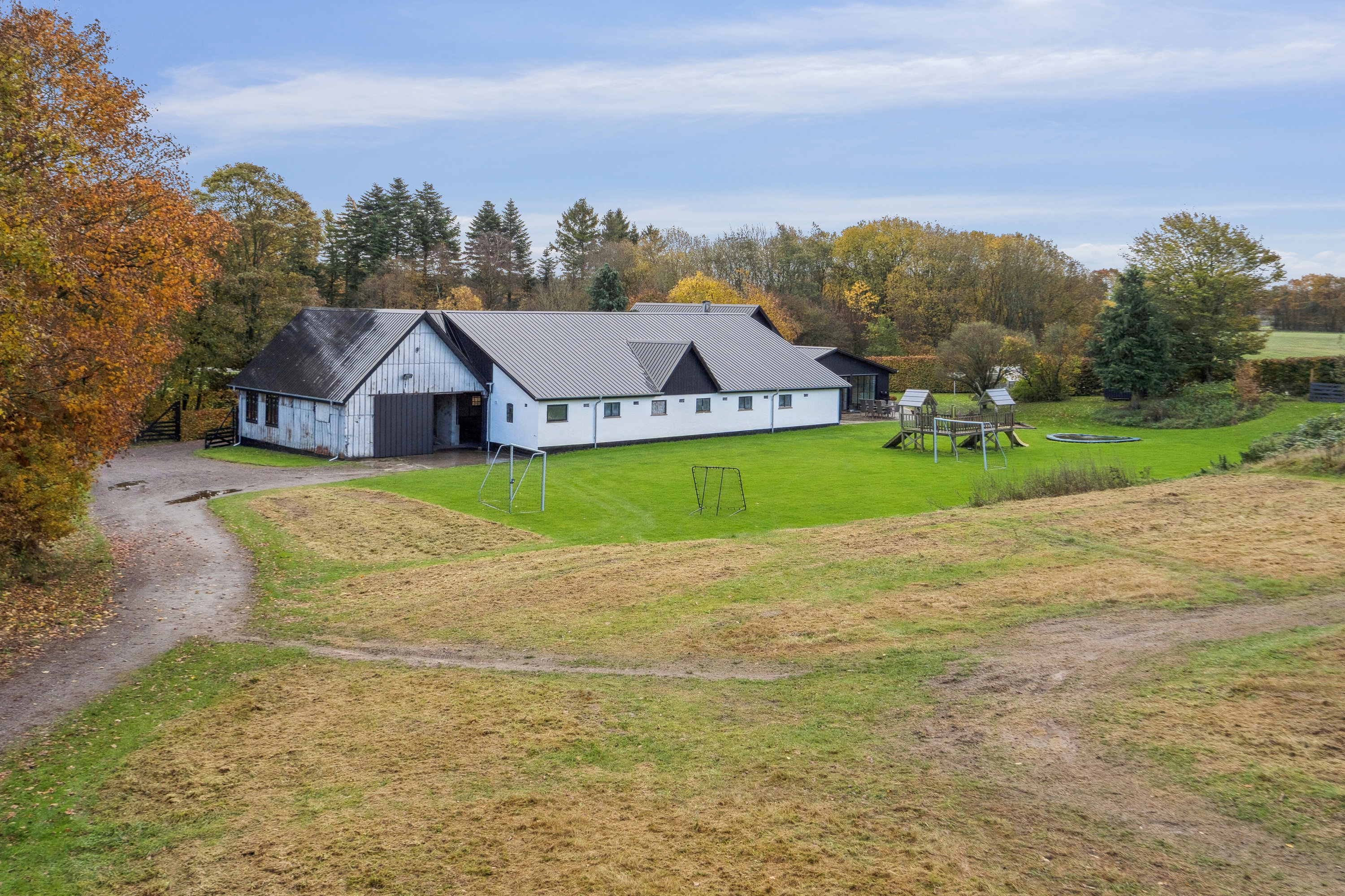 Fremhævet set fra haven billede i fuldskærmstilstand. Billede af Tågelundvej 24, 6040 Egtved