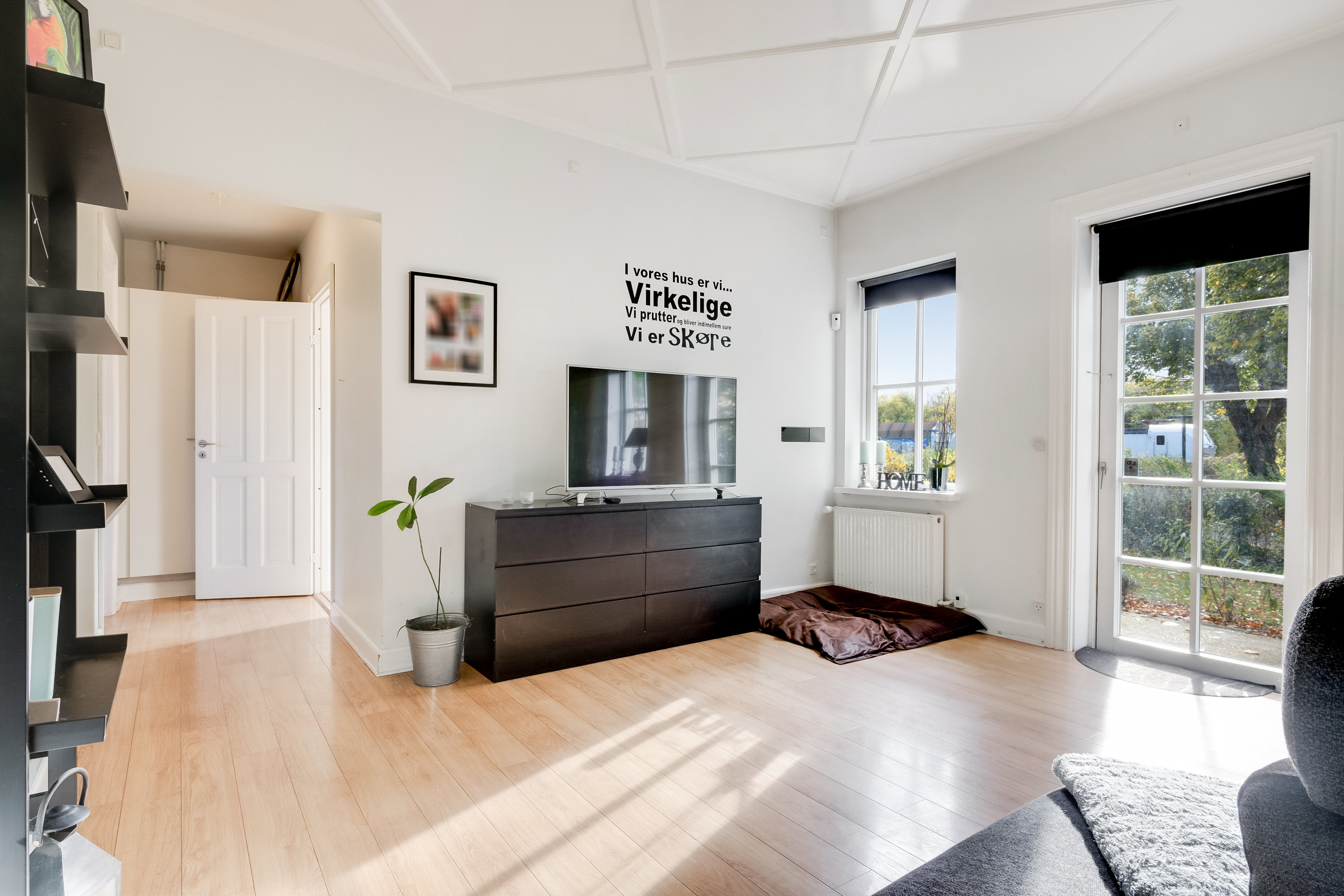 Fremhævet stue billede i fuldskærmstilstand. Billede af Heimdalsvej 12, Kauslunde, 5500 Middelfart