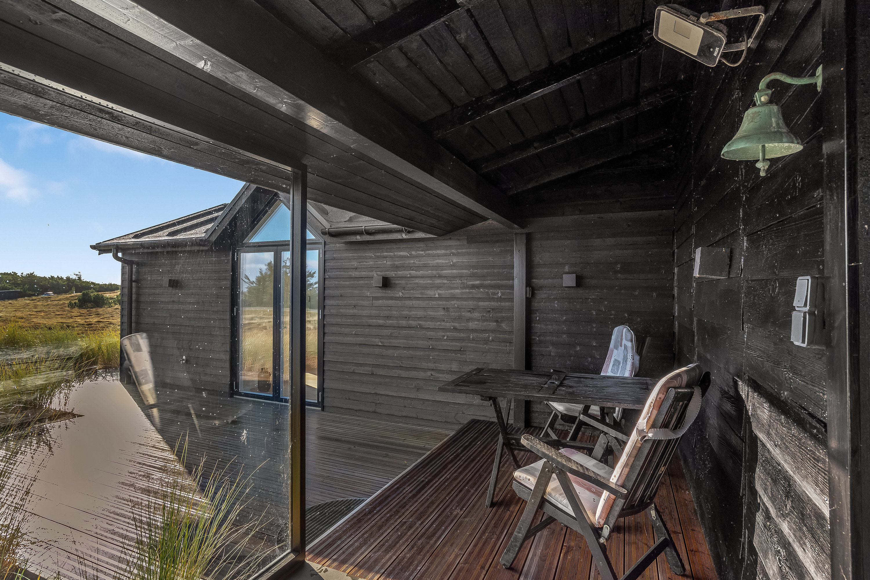 Fremhævet terrasse billede i fuldskærmstilstand. Billede af Sønder Klitvej 198, Haurvig, 6960 Hvide Sande