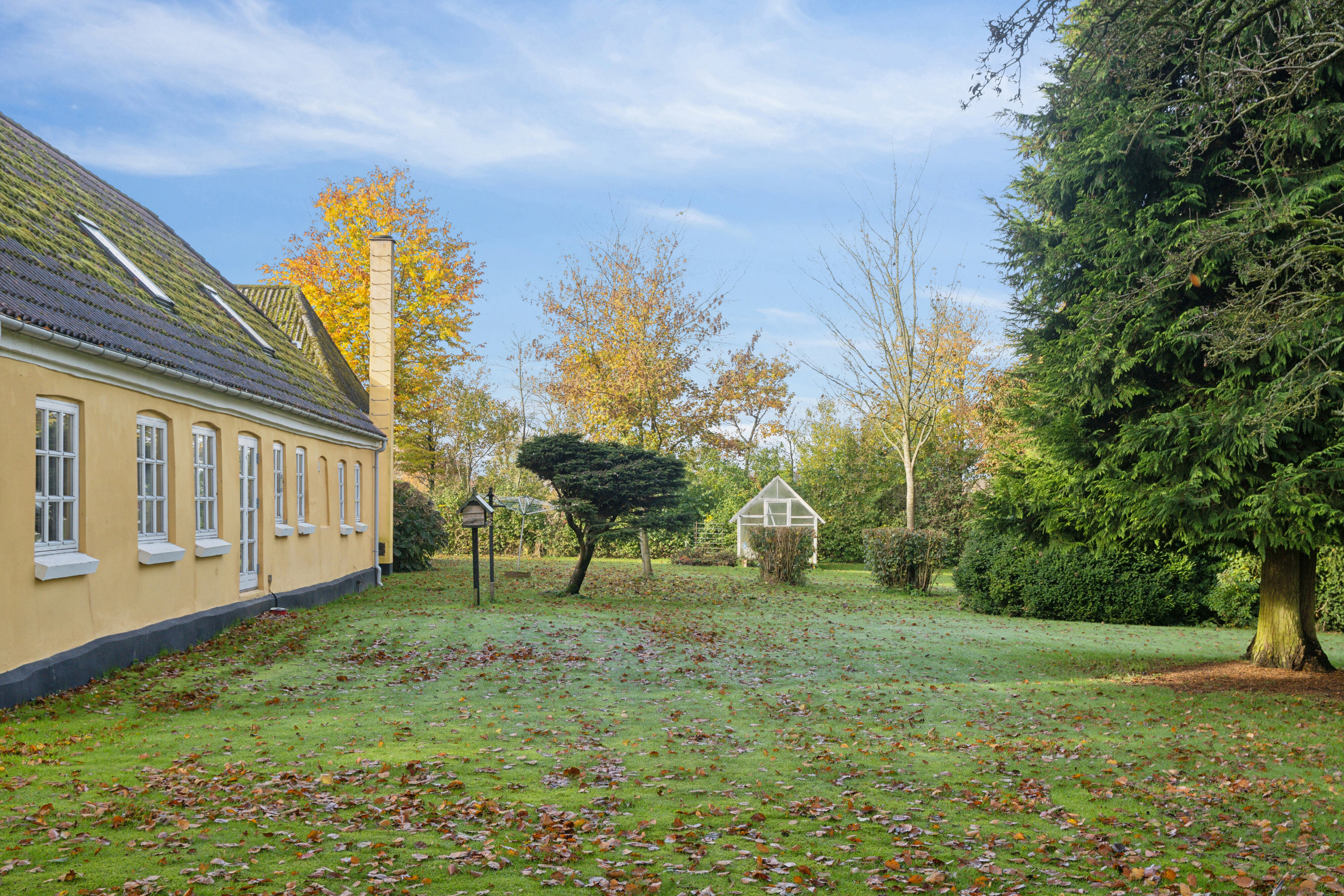 Fremhævet set fra haven billede i fuldskærmstilstand. Billede af Varmkærvej 11, Varmkær, 6040 Egtved