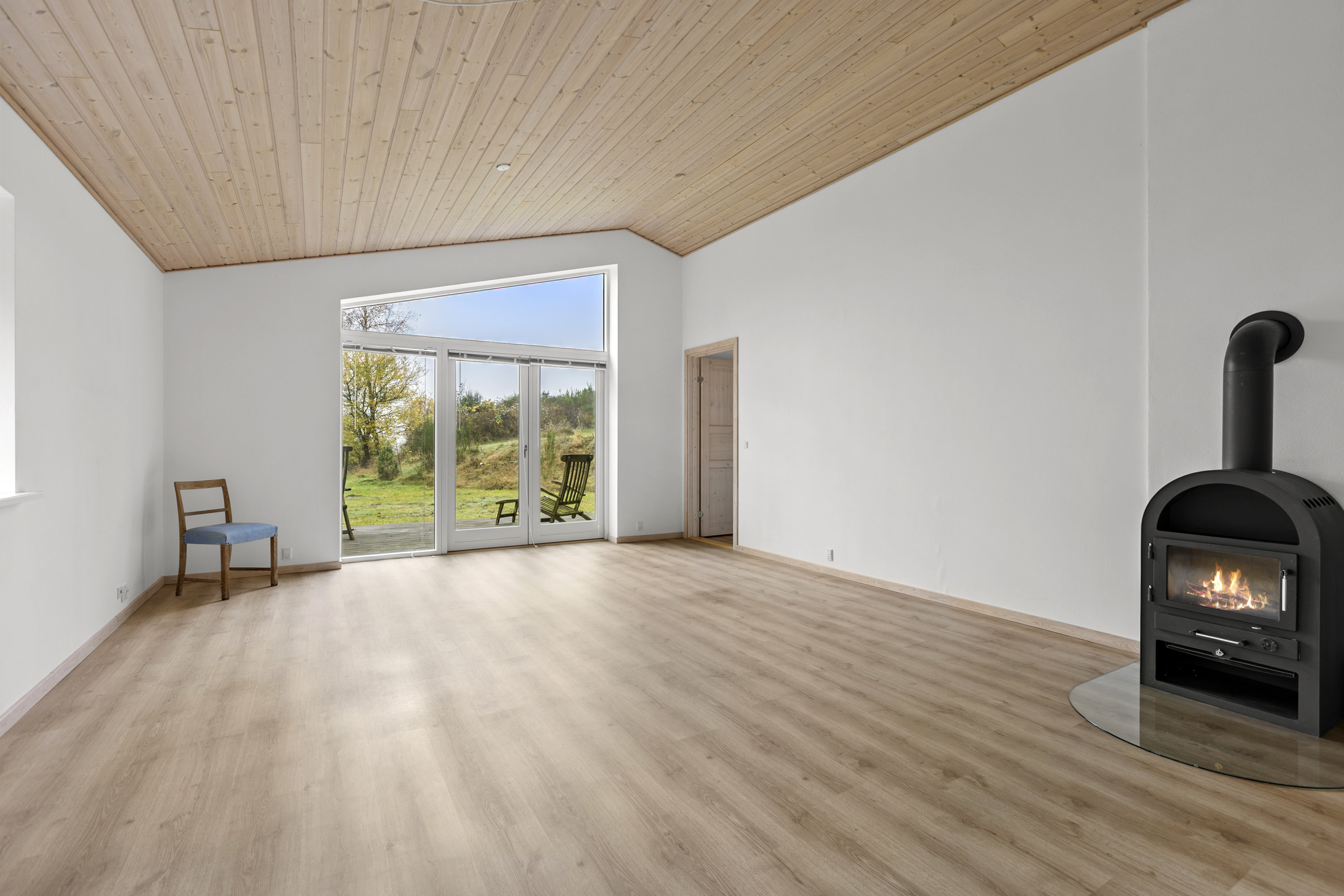 Fremhævet stue billede i fuldskærmstilstand. Billede af Lille Dalbyvej 33, 4140 Borup