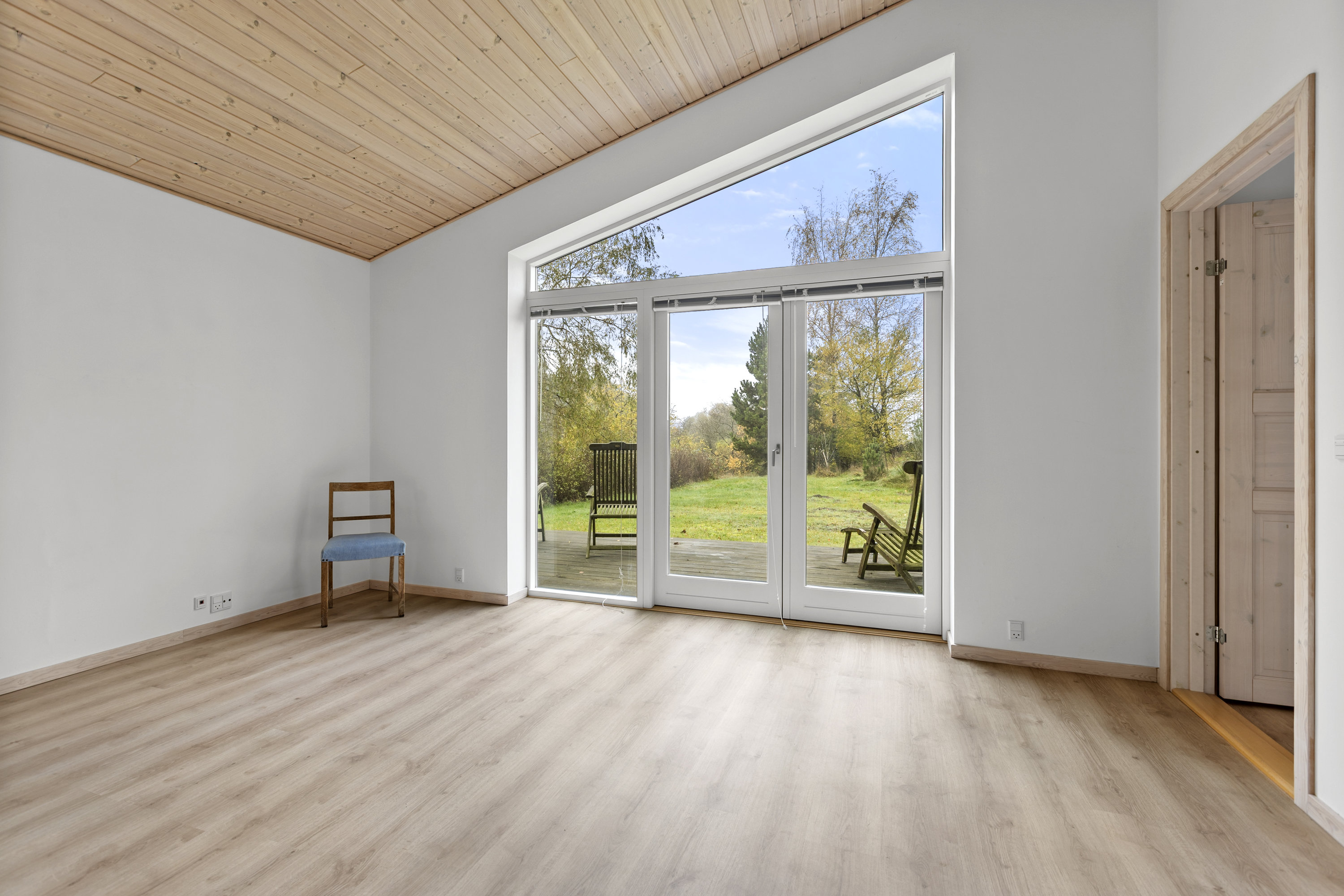 Fremhævet stue billede i fuldskærmstilstand. Billede af Lille Dalbyvej 33, 4140 Borup