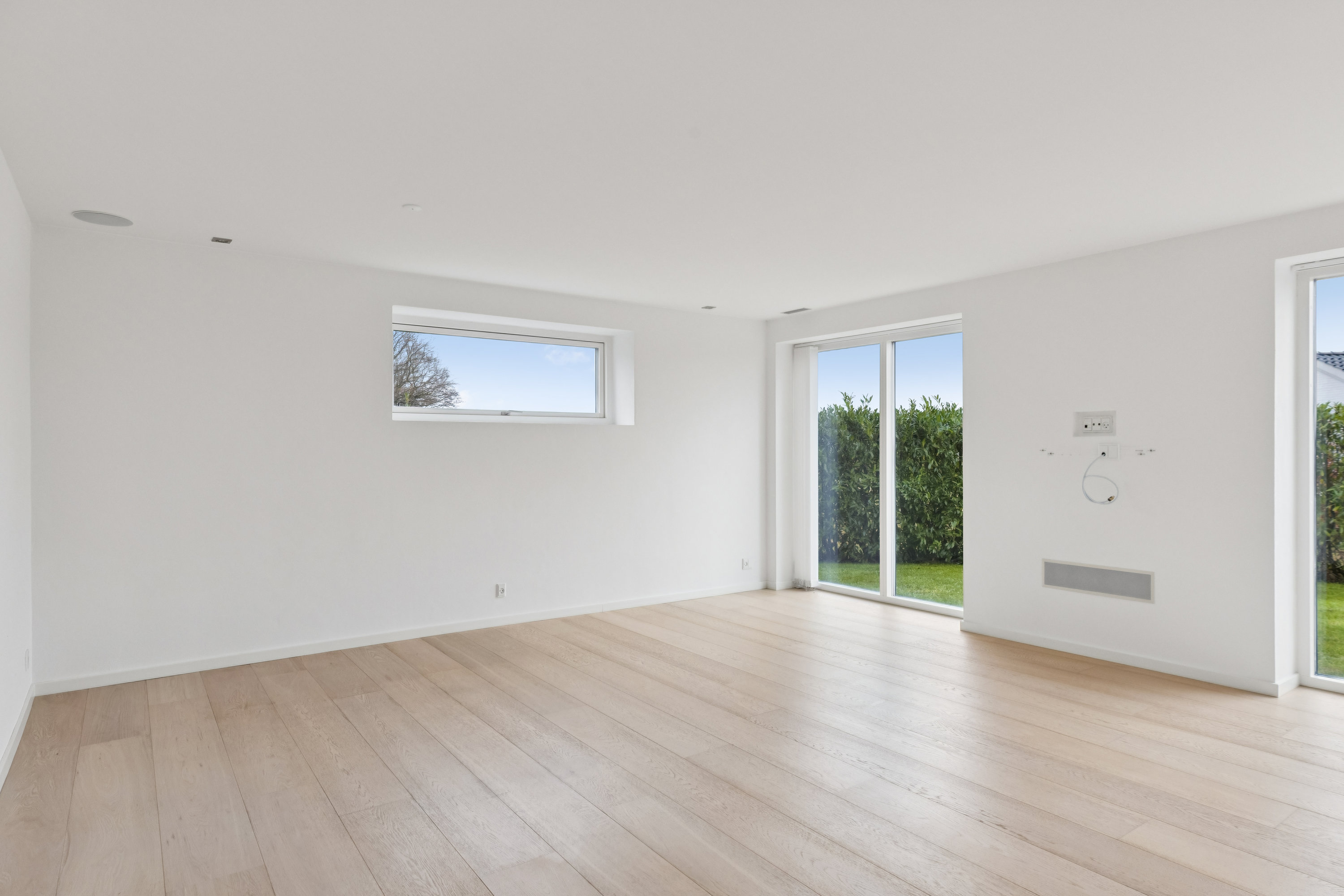 Fremhævet stue billede i fuldskærmstilstand. Billede af Dyrhøj 23, 6300 Gråsten