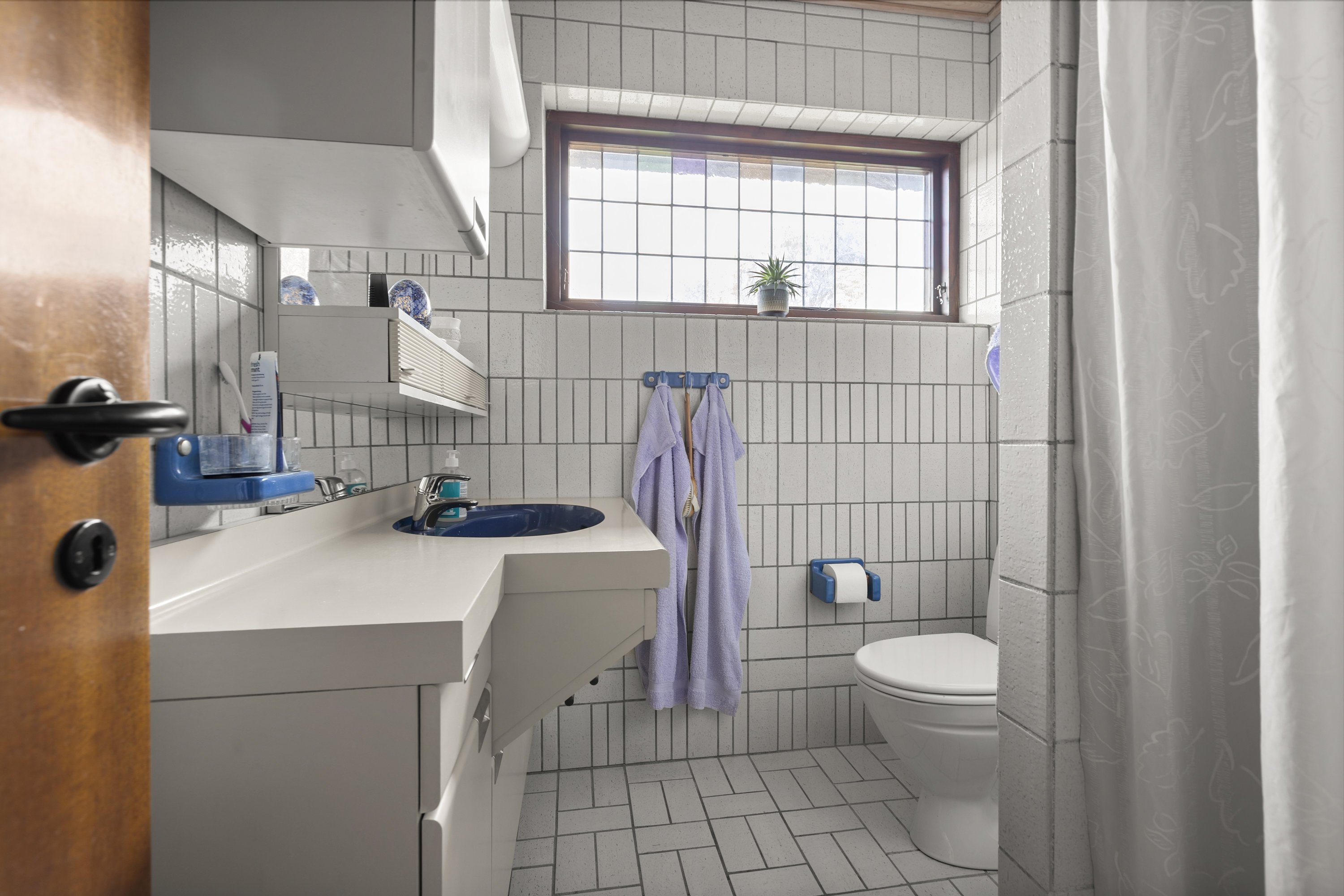 Fremhævet badeværelse billede i fuldskærmstilstand. Billede af Lillevangsparken 13, 4200 Slagelse