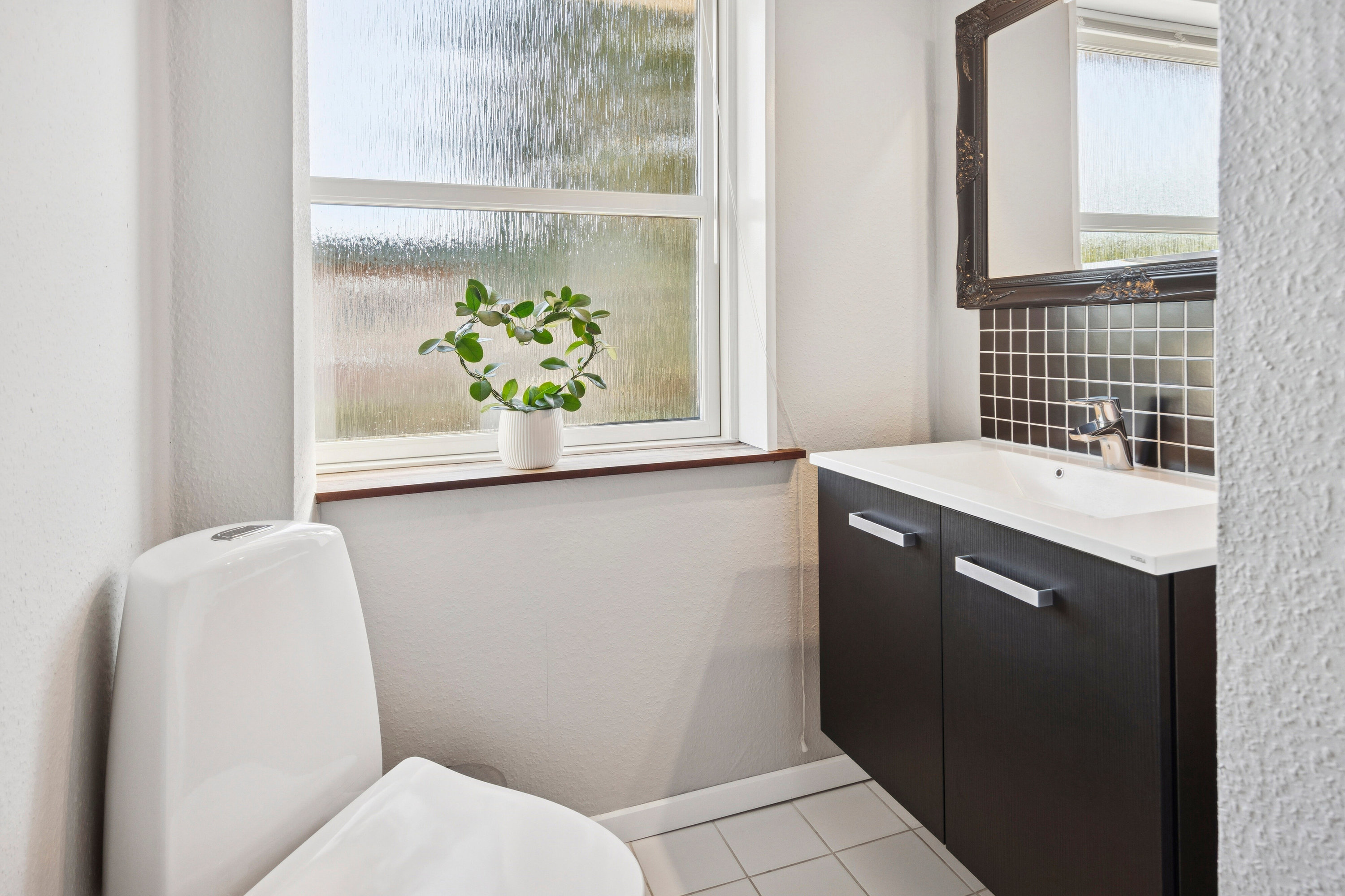 Fremhævet badeværelse billede i fuldskærmstilstand. Billede af Skovvejen 7, 6064 Jordrup