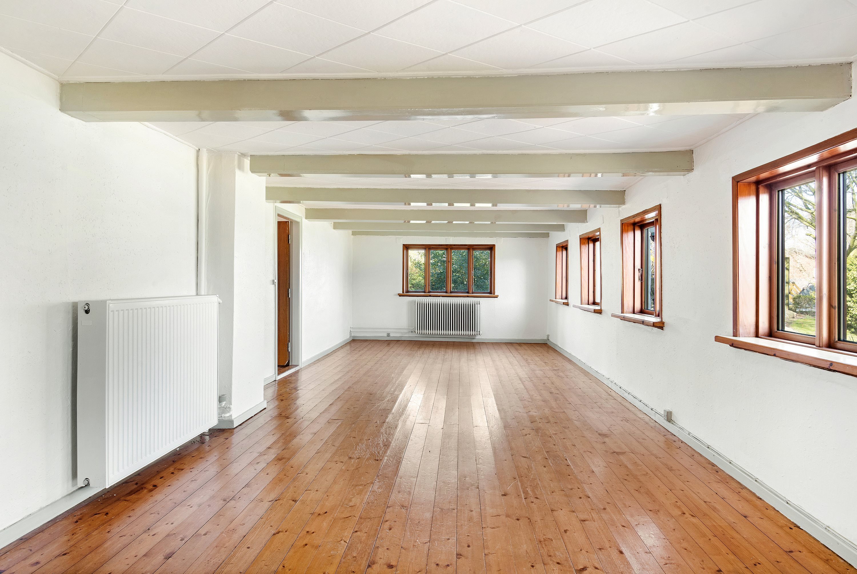 Fremhævet stue billede i fuldskærmstilstand. Billede af Damhusvej 6, 9830 Tårs