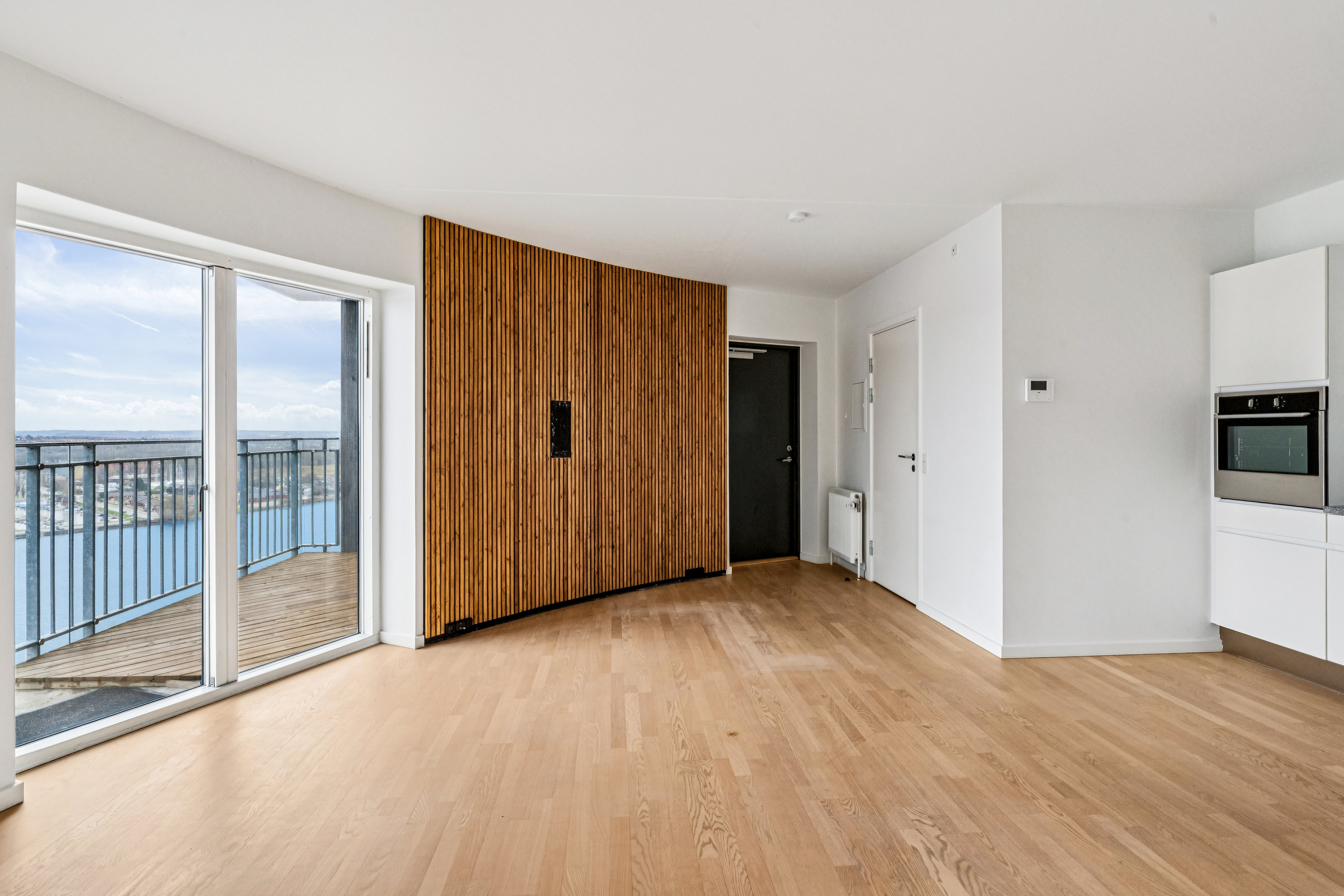 Fremhævet stue billede i fuldskærmstilstand. Billede af Lindholm Brygge 30, 15. 2., 9400 Nørresundby