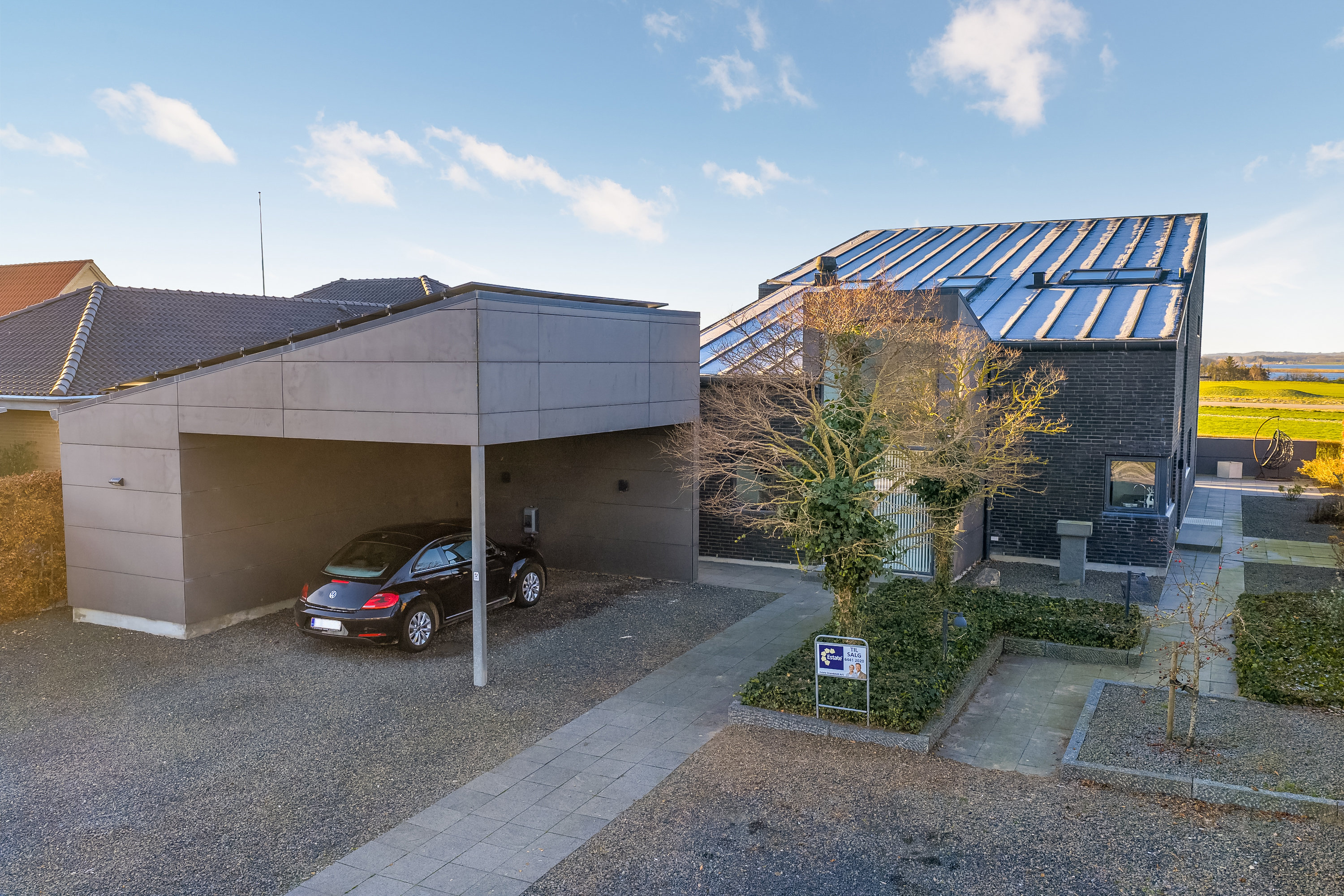 Fremhævet facade billede i fuldskærmstilstand. Billede af Rømøvænget 11, 5500 Middelfart