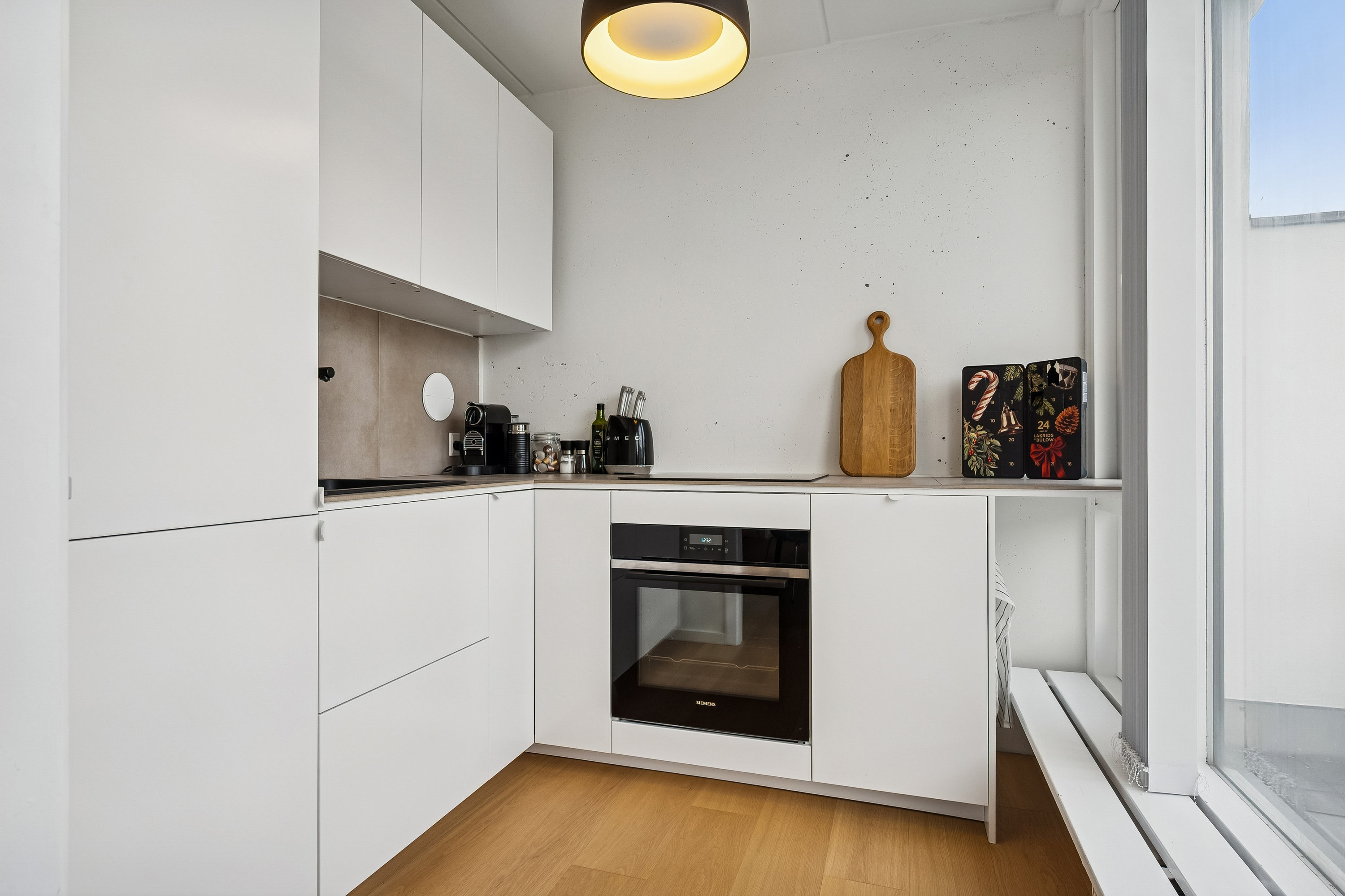 Fremhævet køkken billede i fuldskærmstilstand. Billede af Brannersvej 25, 2. 65., 2920 Charlottenlund