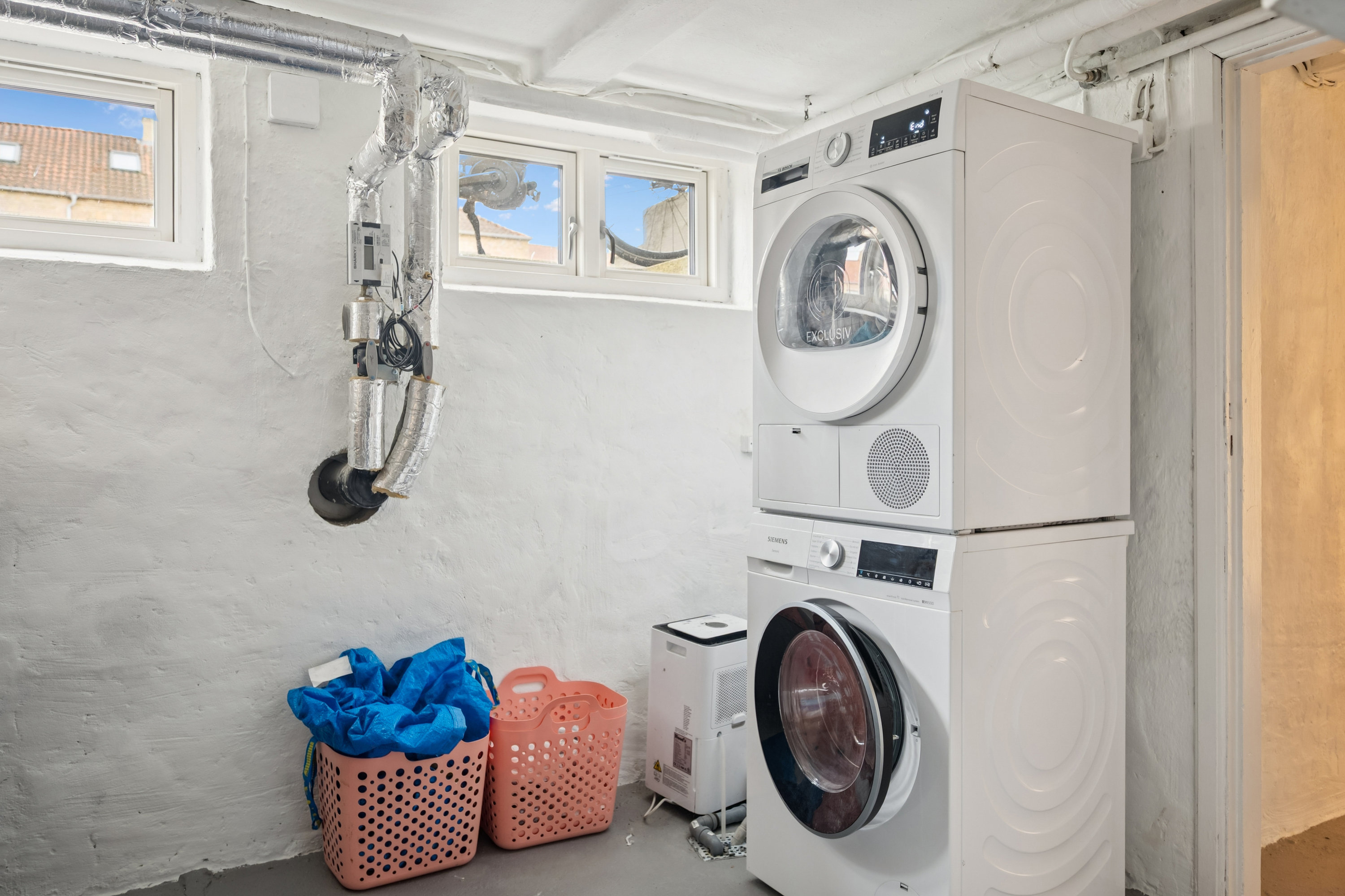 Fremhævet vaskerum billede i fuldskærmstilstand. Billede af Buddingevej 46A, 2800 Kongens Lyngby