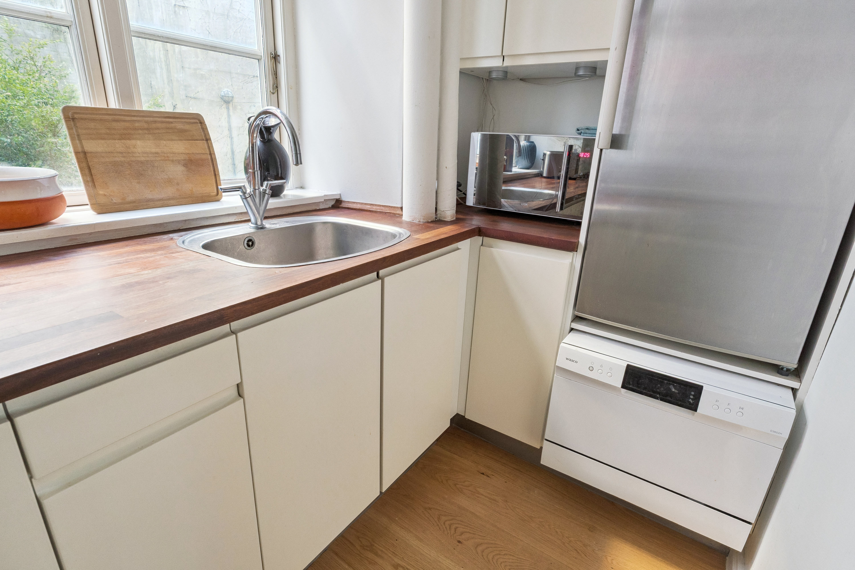 Fremhævet køkken billede i fuldskærmstilstand. Billede af Olfert Fischers Gade 4, st.. Th.., 1311 København K