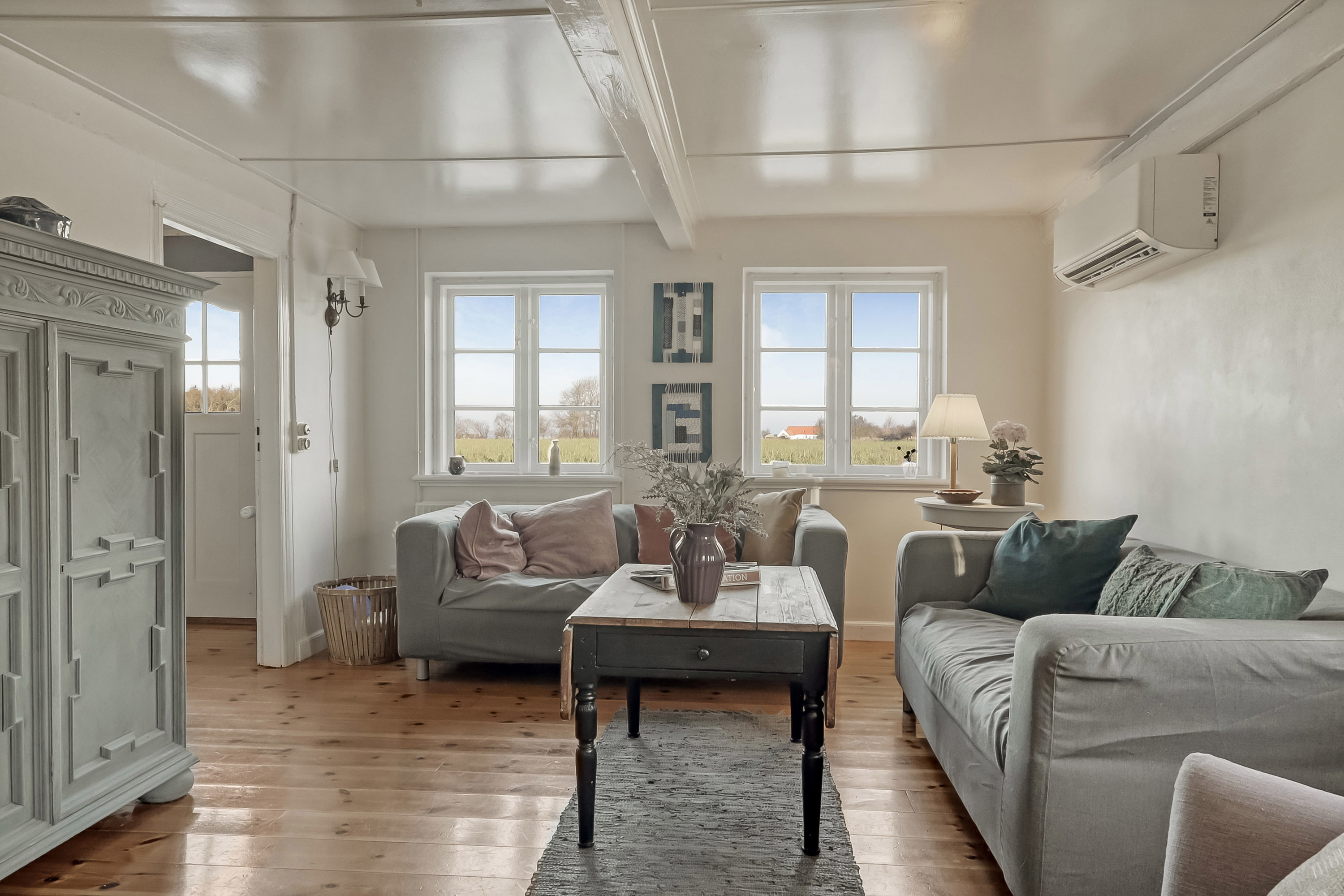 Fremhævet stue billede i fuldskærmstilstand. Billede af Trousløkkevej 1, 5960 Marstal