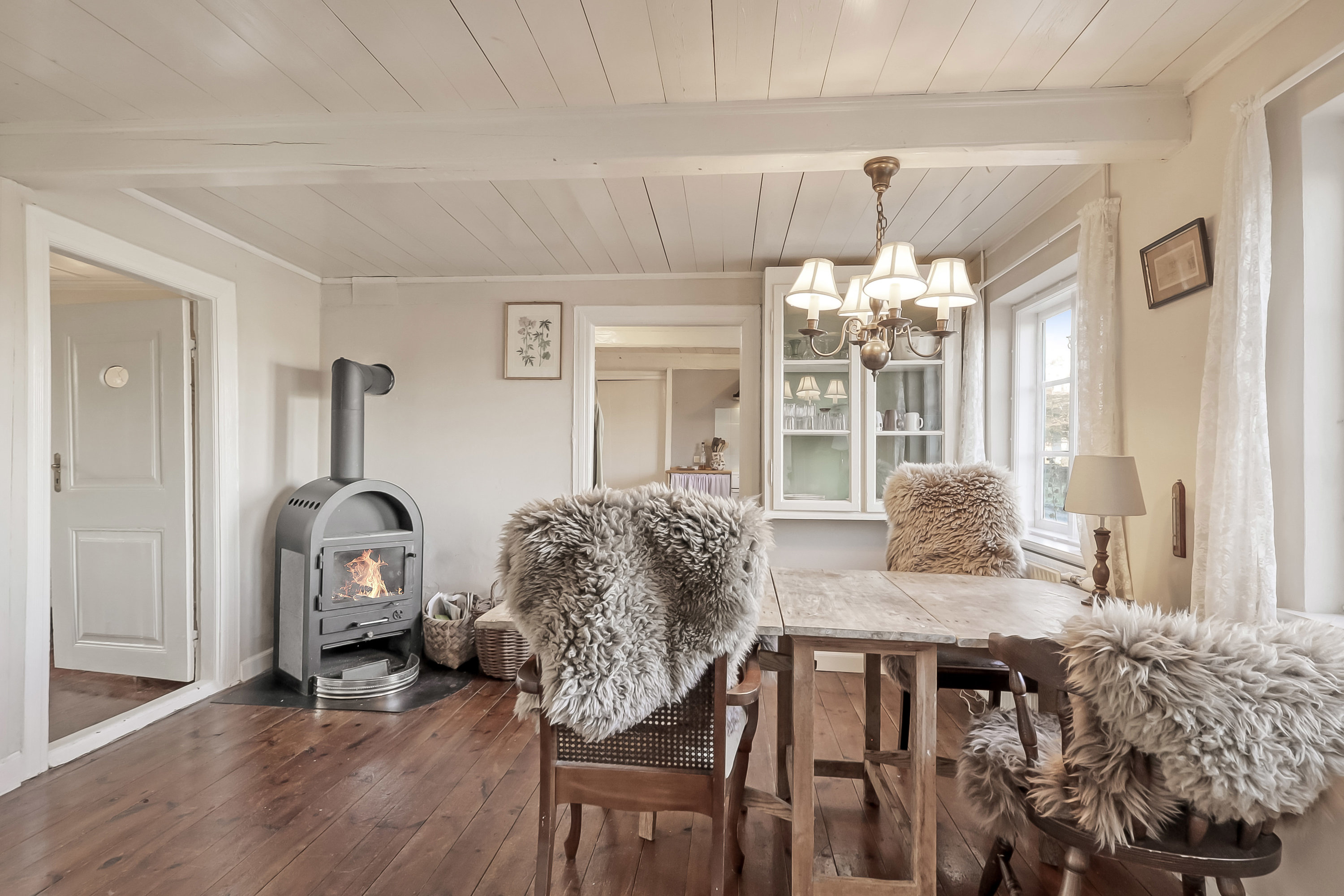 Fremhævet stue billede i fuldskærmstilstand. Billede af Trousløkkevej 1, 5960 Marstal