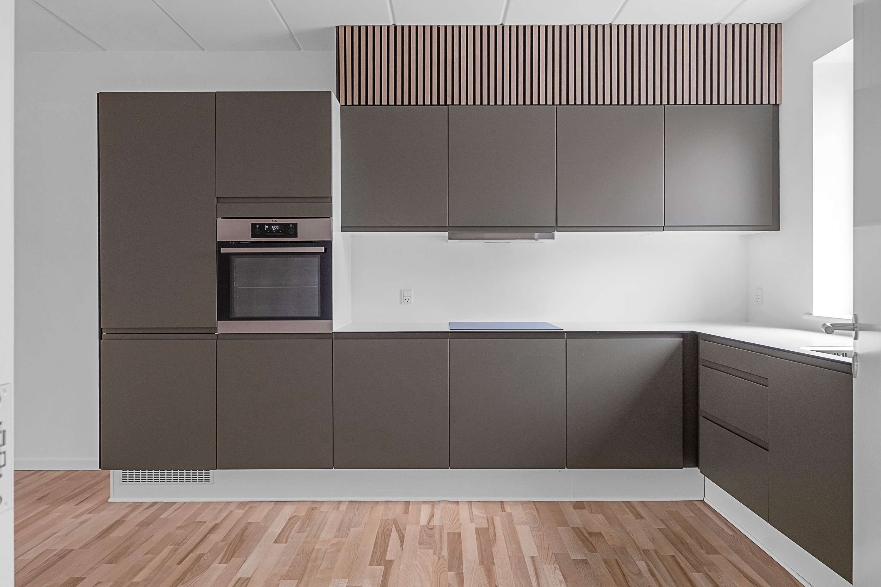 Fremhævet køkken billede i fuldskærmstilstand. Billede af Brobjerg Parkvej 86f, 8250 Egå