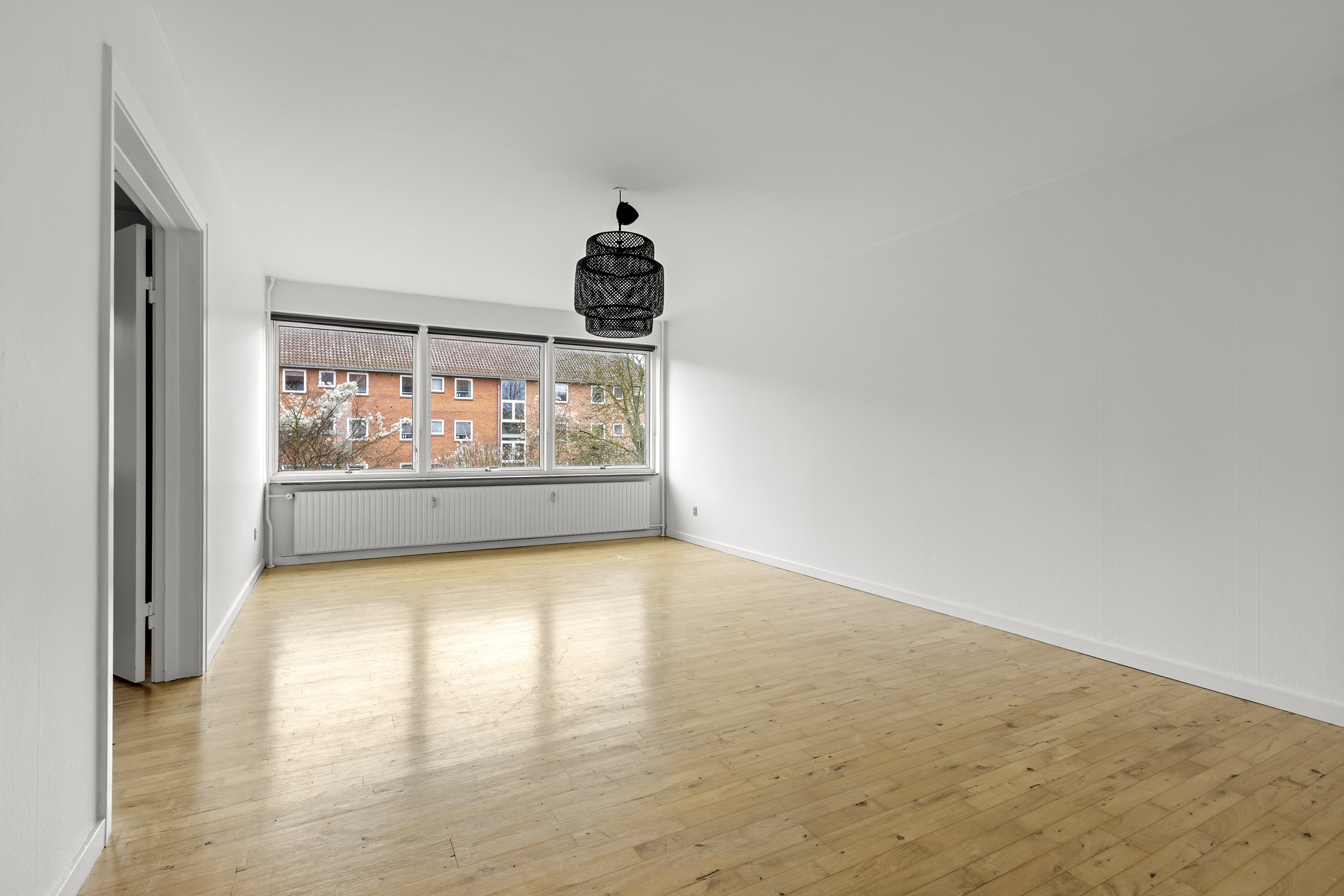 Fremhævet stue billede i fuldskærmstilstand. Billede af Vilhelm Andersensvej 10, st.. th., 4100 Ringsted