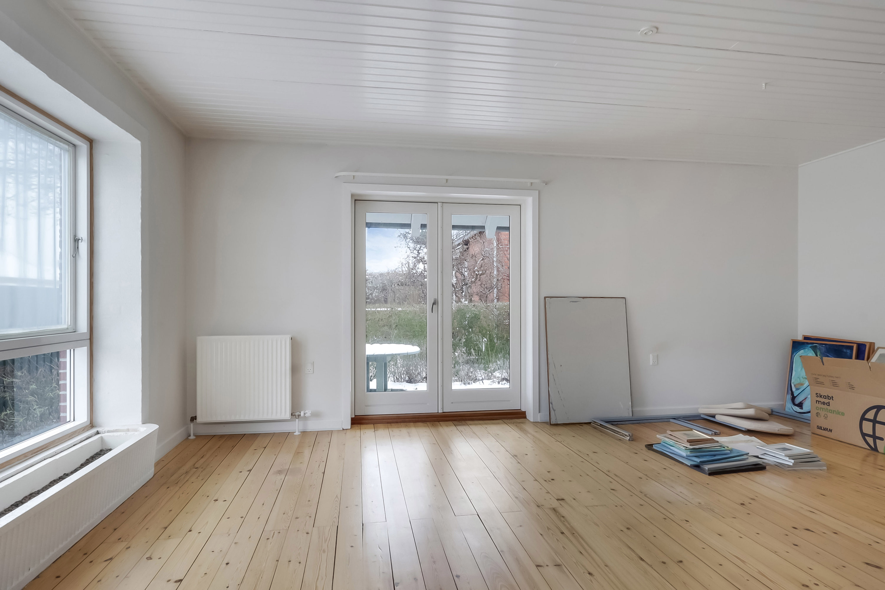 Fremhævet stue billede i fuldskærmstilstand. Billede af Klampenborgvej 53, 5700 Svendborg