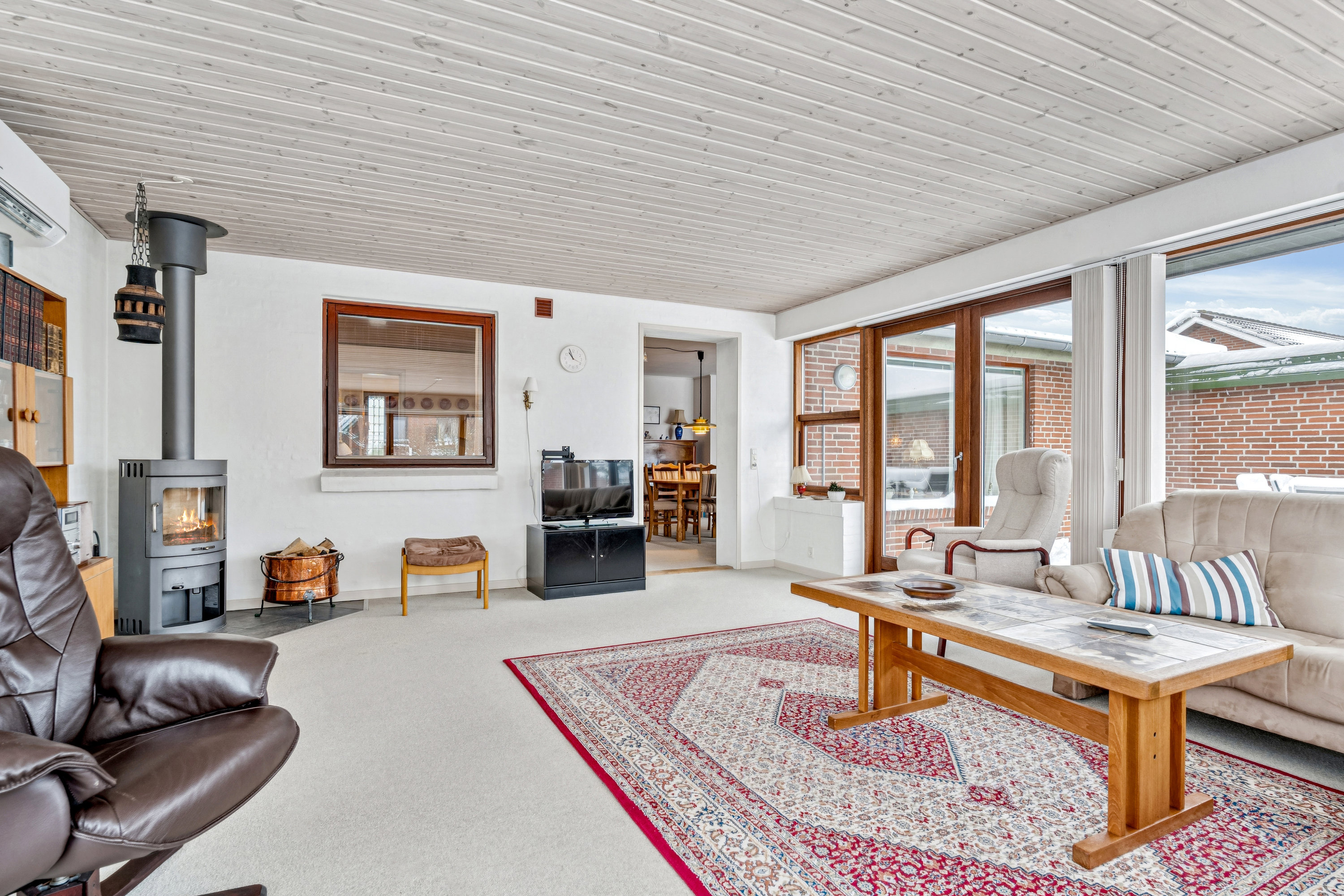 Fremhævet stue/udestue billede i fuldskærmstilstand. Billede af Spættevej 42, Ø Snede, 8723 Løsning