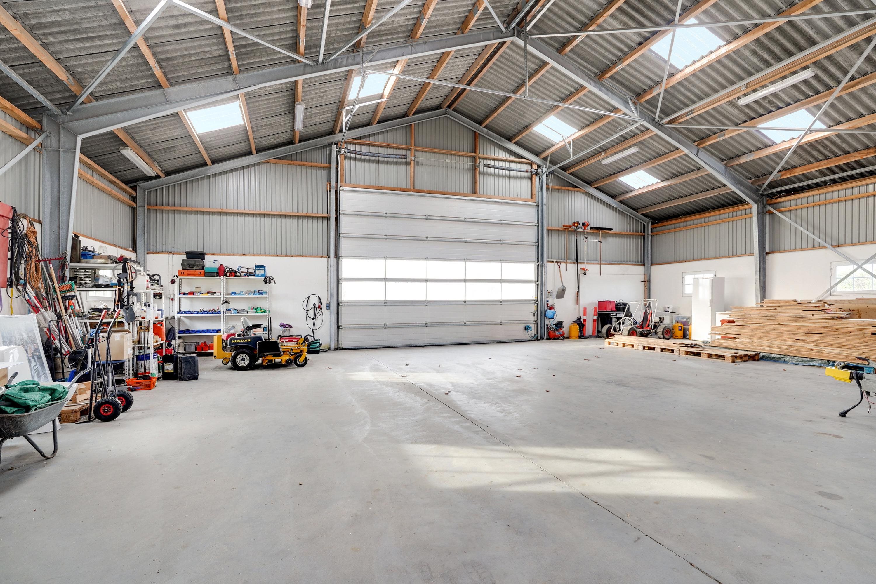 Fremhævet garage billede i fuldskærmstilstand. Billede af Strandhuse 8, Bregninge, 4871 Horbelev