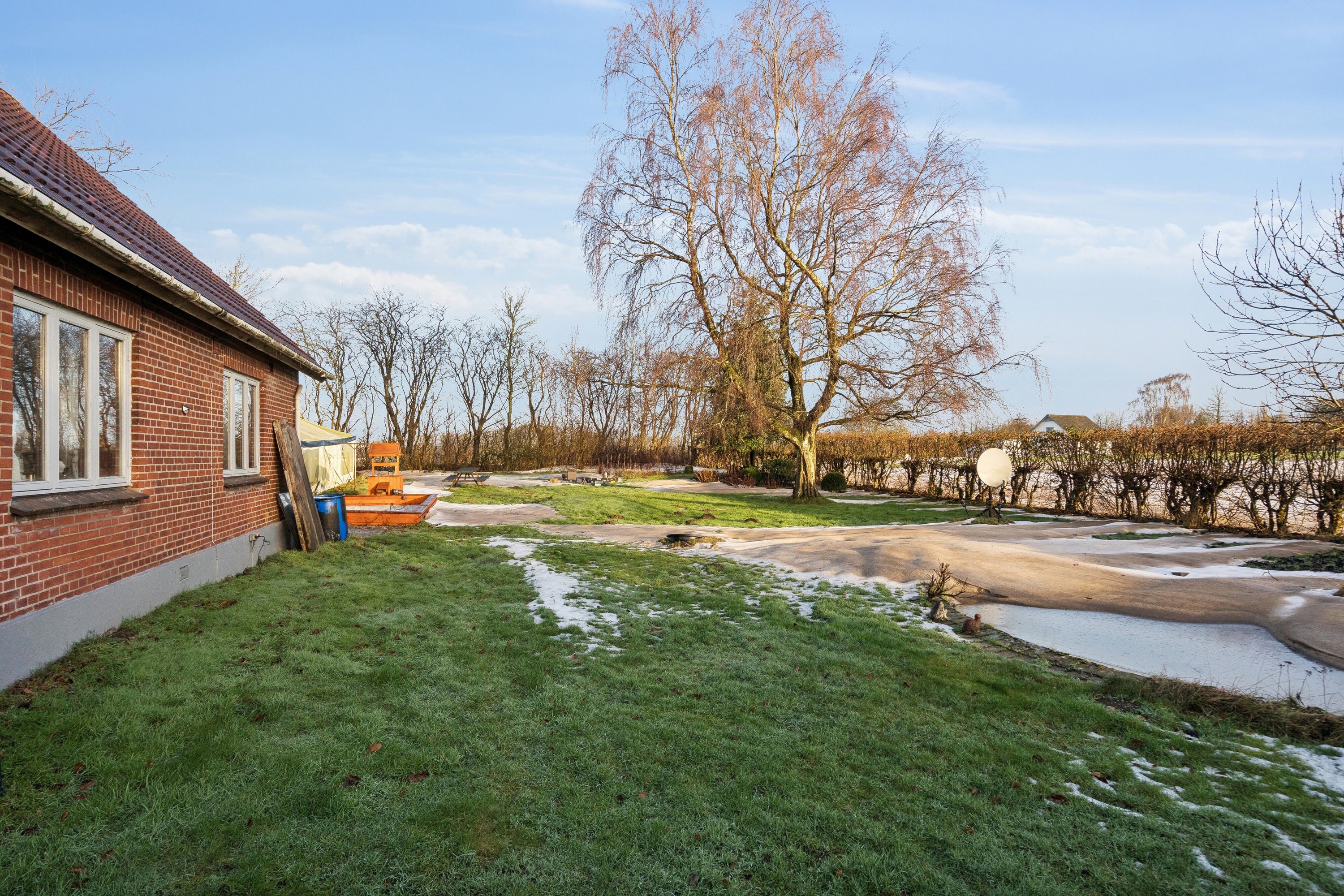 Fremhævet set fra haven billede i fuldskærmstilstand. Billede af Knudsbølvej 15, Bølling, 6040 Egtved