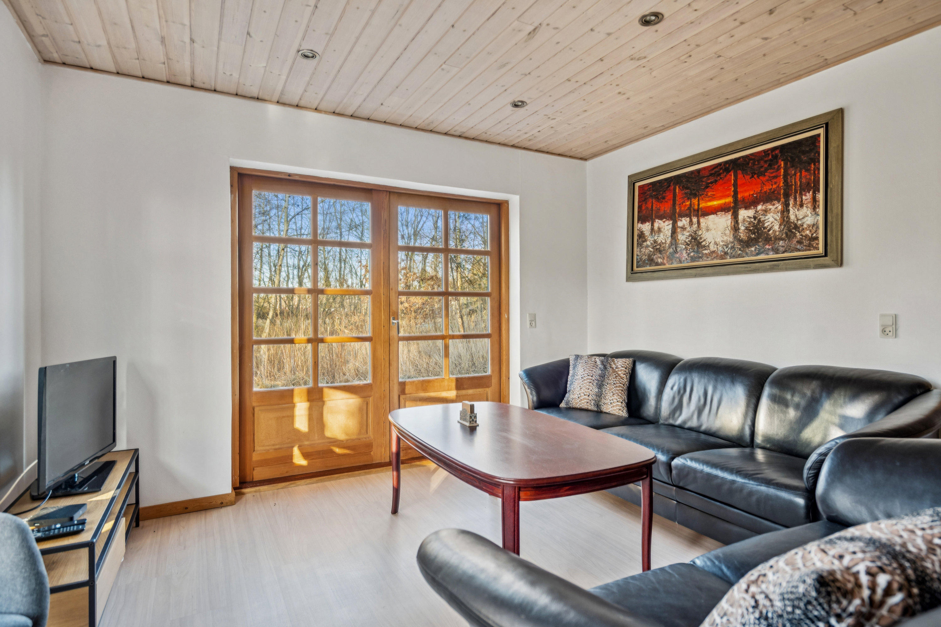 Fremhævet stue billede i fuldskærmstilstand. Billede af Smørblomstvej 2, Vesterø Havn, 9940 Læsø