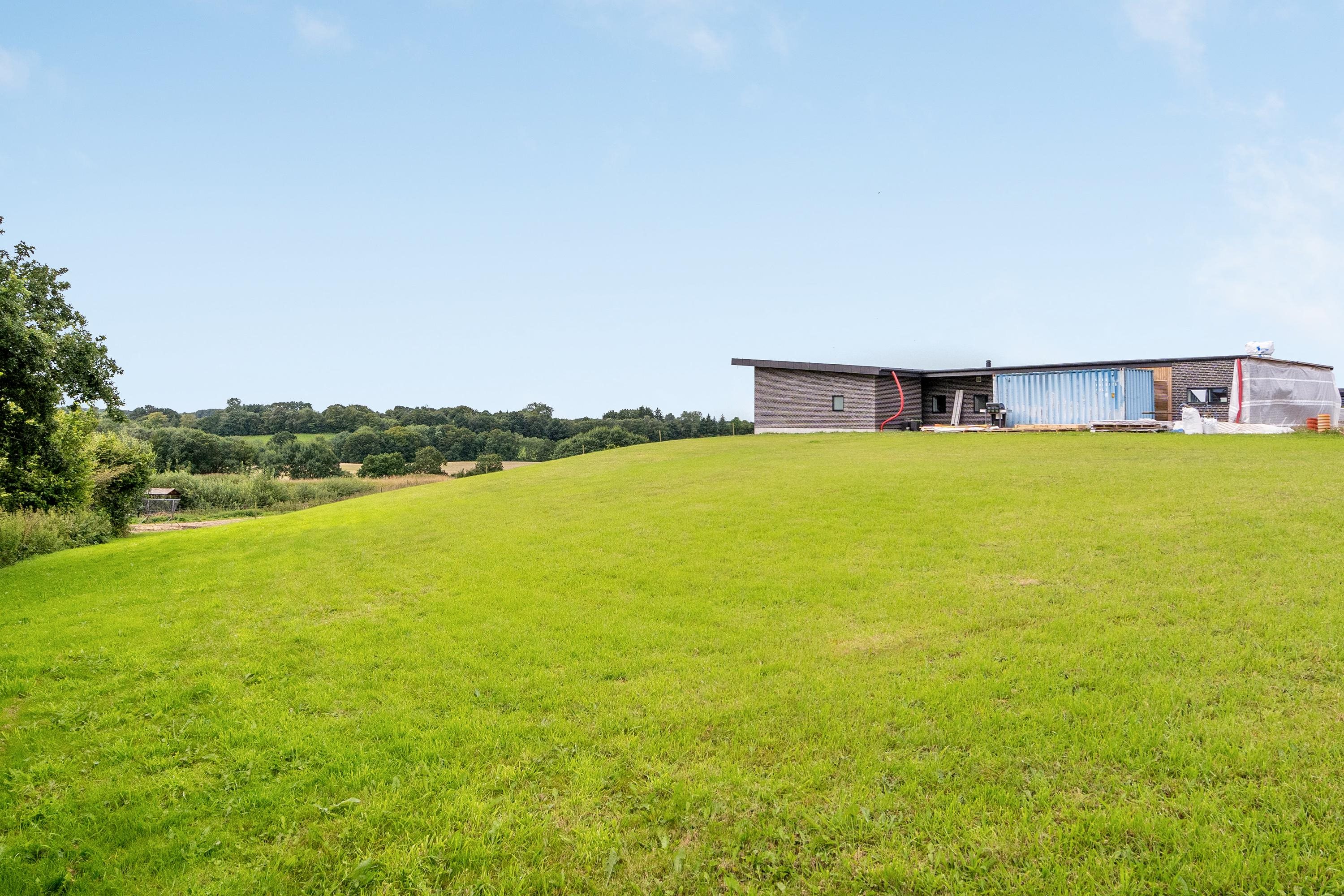 Fremhævet grund billede i fuldskærmstilstand. Billede af Hjelmdrupvej 64, 6040 Egtved