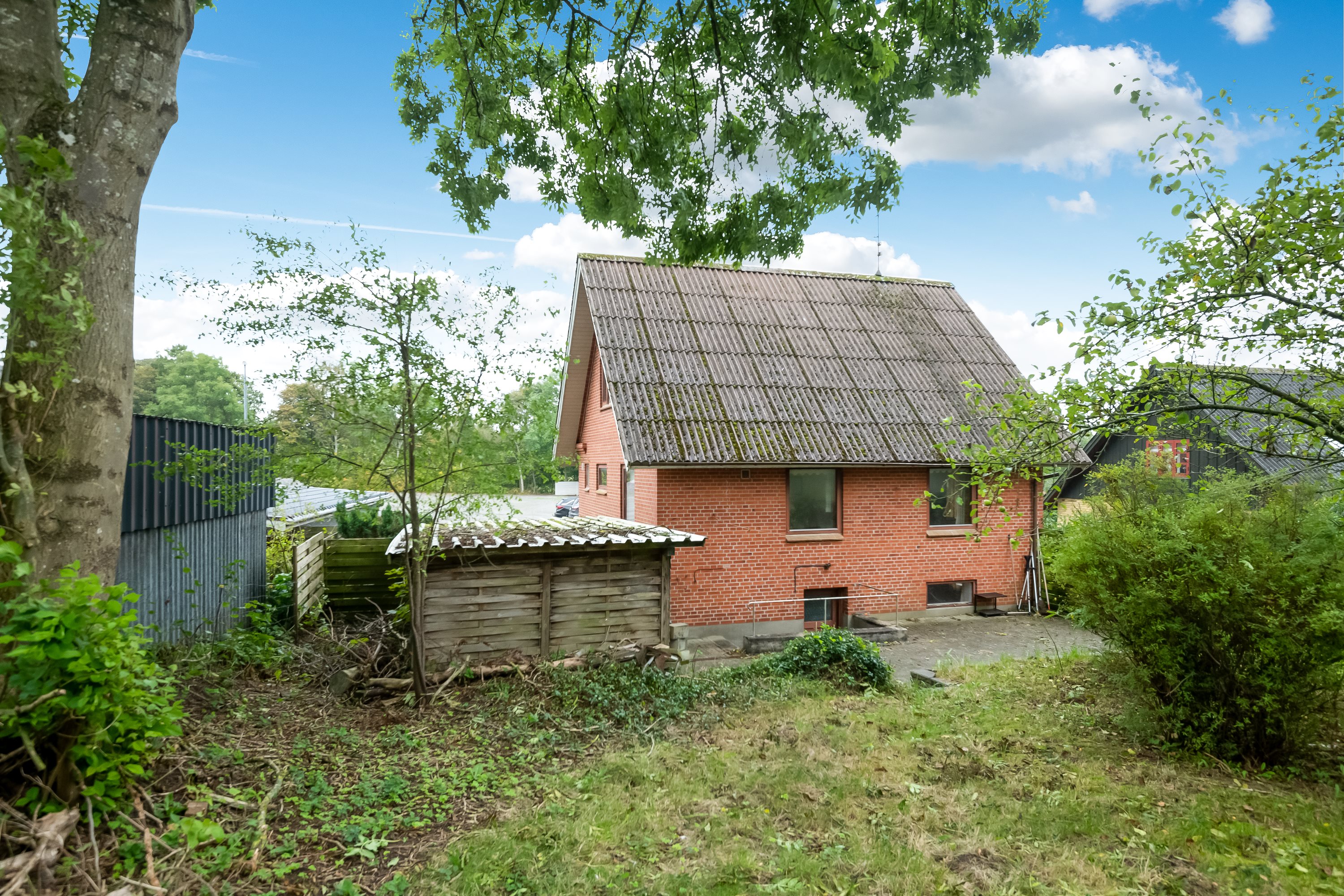 Fremhævet set fra haven billede i fuldskærmstilstand. Billede af Kammervej 11, Lendum, 9870 Sindal