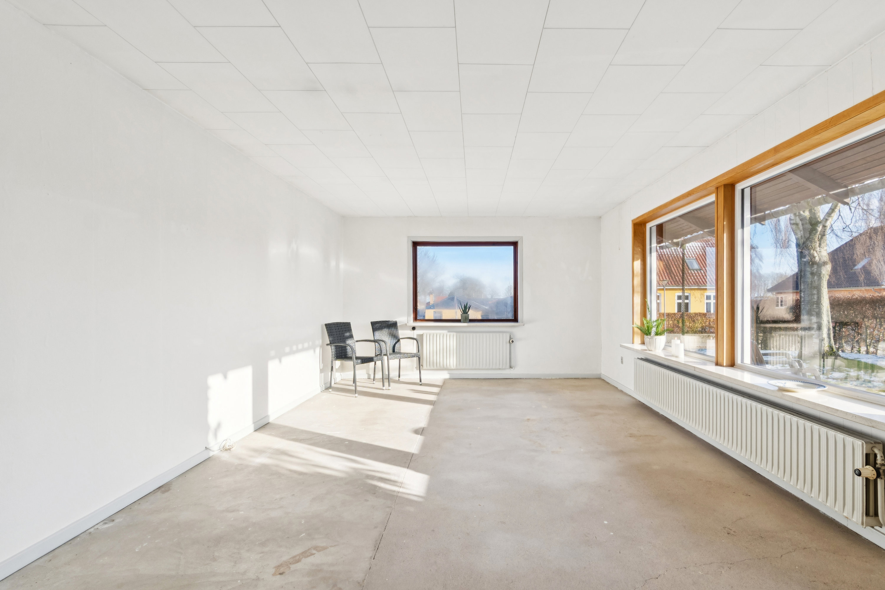 Fremhævet stue billede i fuldskærmstilstand. Billede af Varnæsvigvej 27, Varnæs, 6200 Aabenraa