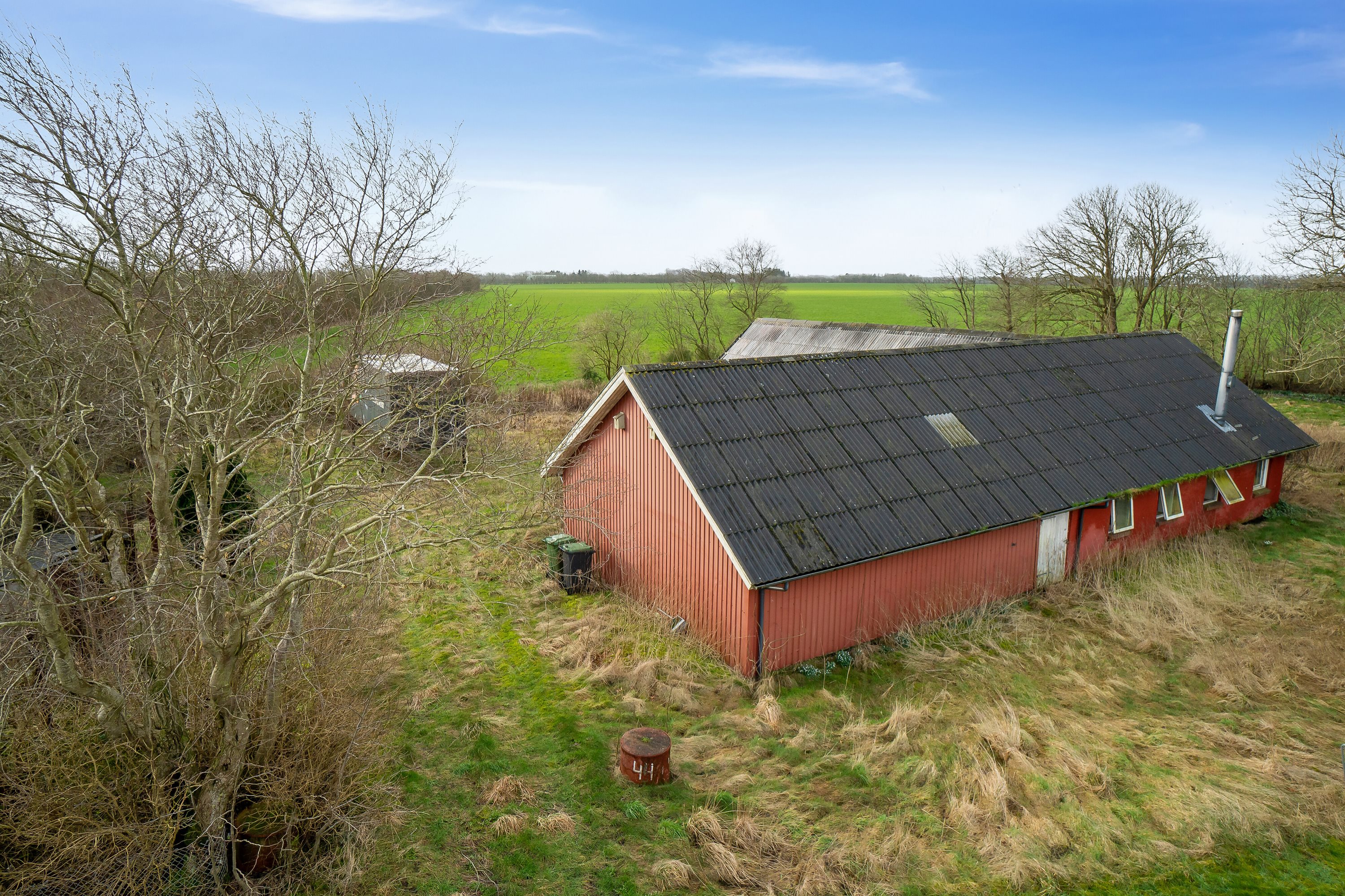 Fremhævet set fra haven billede i fuldskærmstilstand. Billede af Lindbjergvej 44, 6870 Ølgod