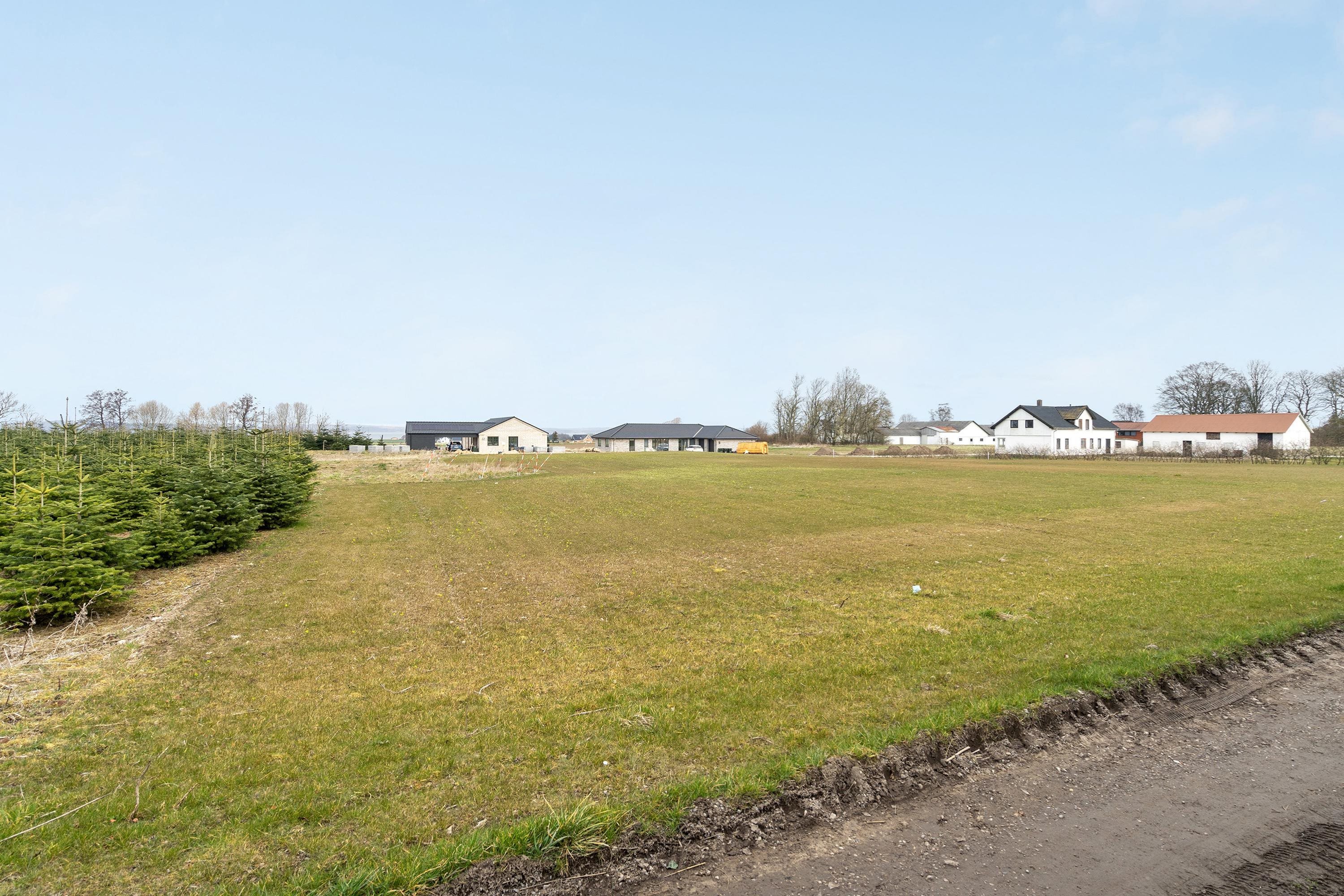 Fremhævet byggegrund billede i fuldskærmstilstand. Billede af Blomstervænget 1, Brund, 7130 Juelsminde